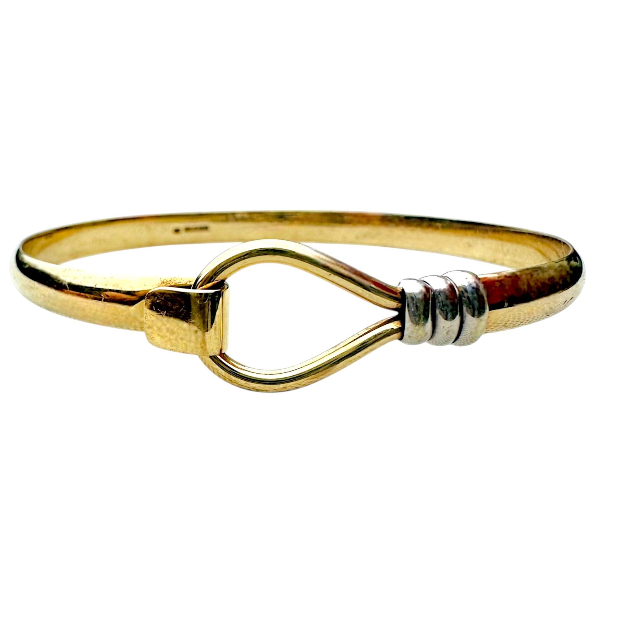 front view of Vintage Two Tone Gold Bangle Bracelet with white background