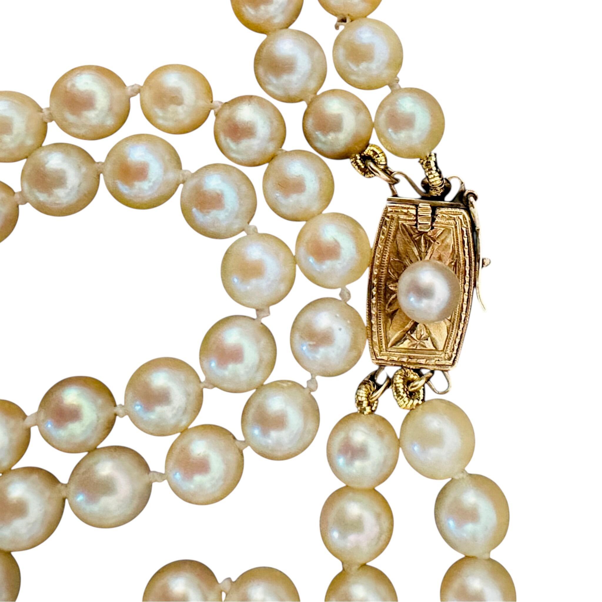 close up of 14k Mikimoto Two Row Cultured Pearl Necklace, with white background