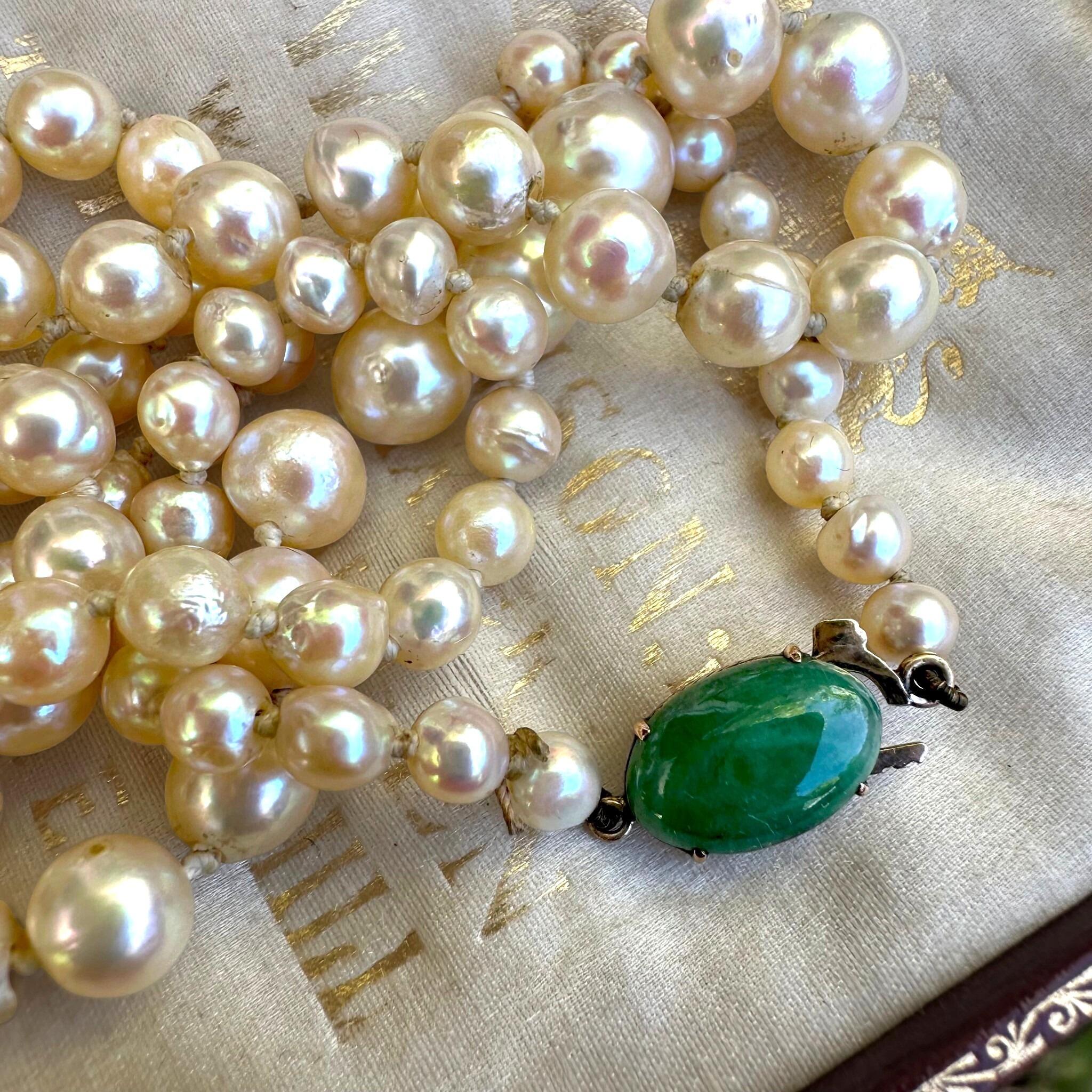 Antique Cultured Saltwater Baroque Pearl & 14k Gold Jadeite Clasp Necklace displayed on antique box