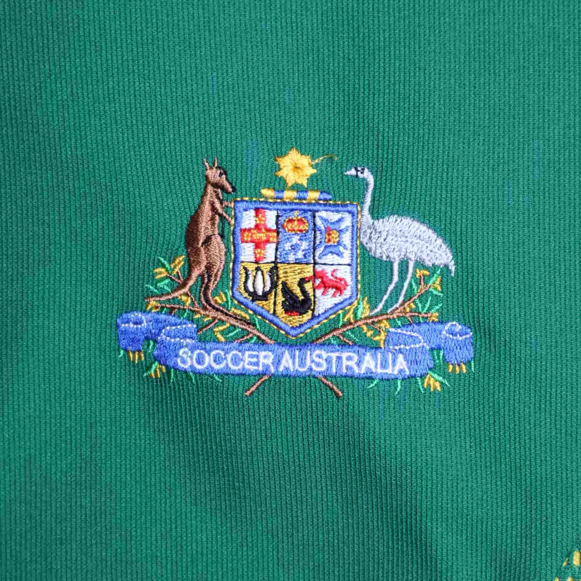 Australia football team badge on a green shirt