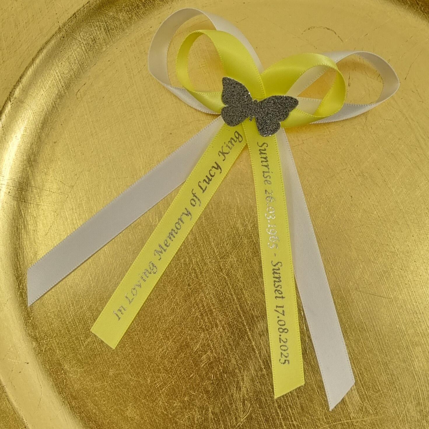 Double loop memorial ribbon with two double loops