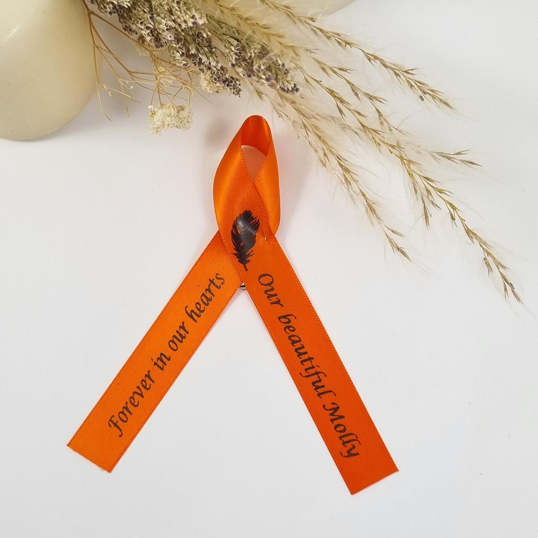 funeral ribbon with feather