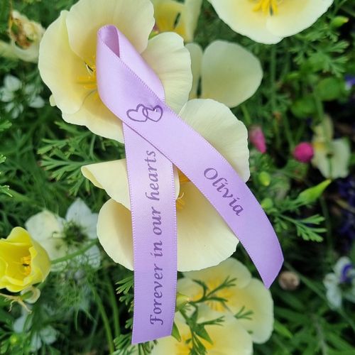 womens funeral ribbons in lilac