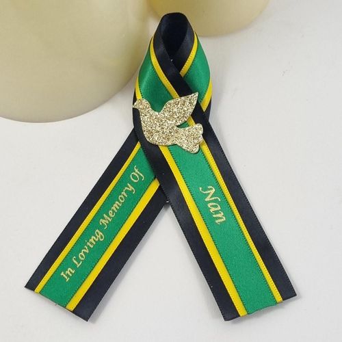 Jamaican funeral favour. Funeral ribbon for Jamaica in green, gold and black to represent the flag