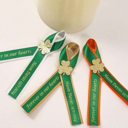 Irish Funeral Favors. Emerald green, gold, white and orange ribbon with gold glitter shamrock