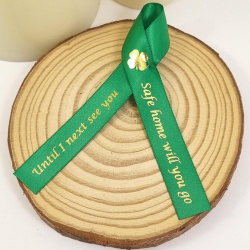 Gold four leaf clover Irish memorial ribbons.
