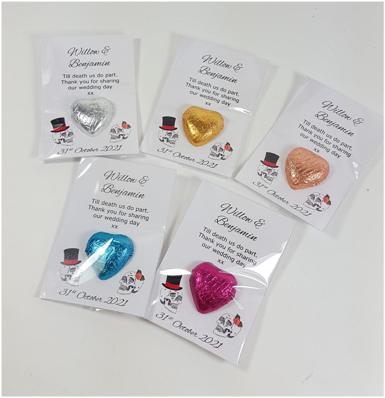 Goth wedding favours with gold, fuchsia, blue, rose gold and silver chocolate hearts