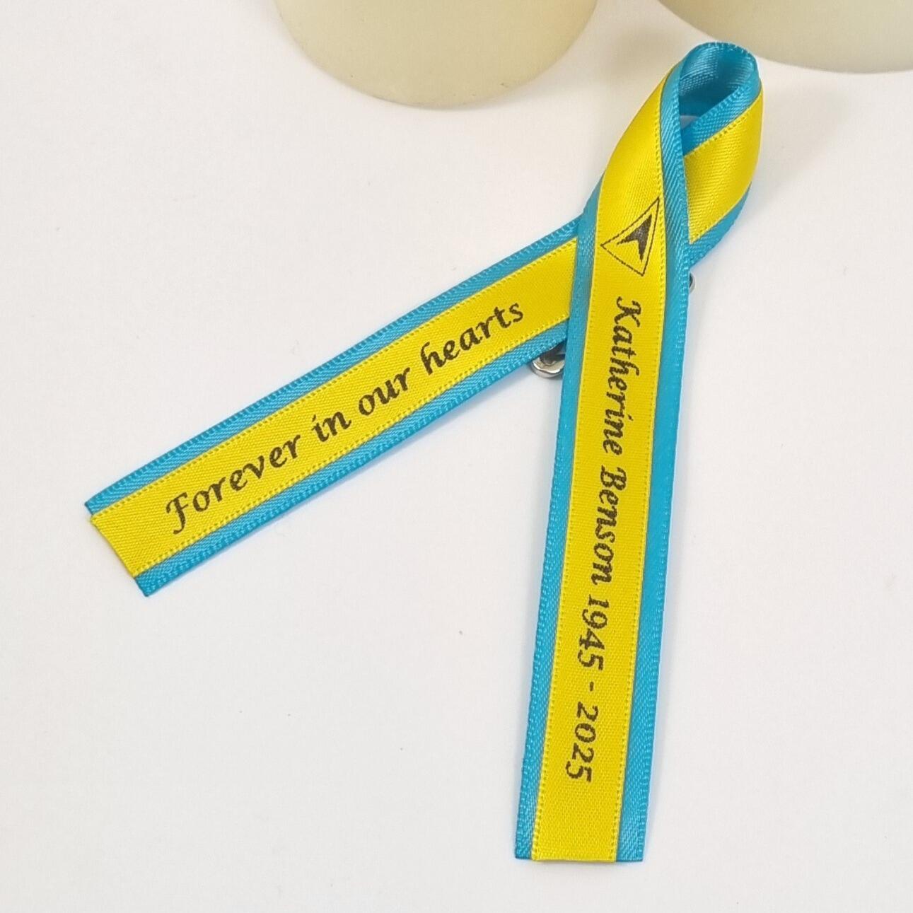 St Lucian Funeral Favours. Made with Tropical sea blue and sunflower yellow ribbon