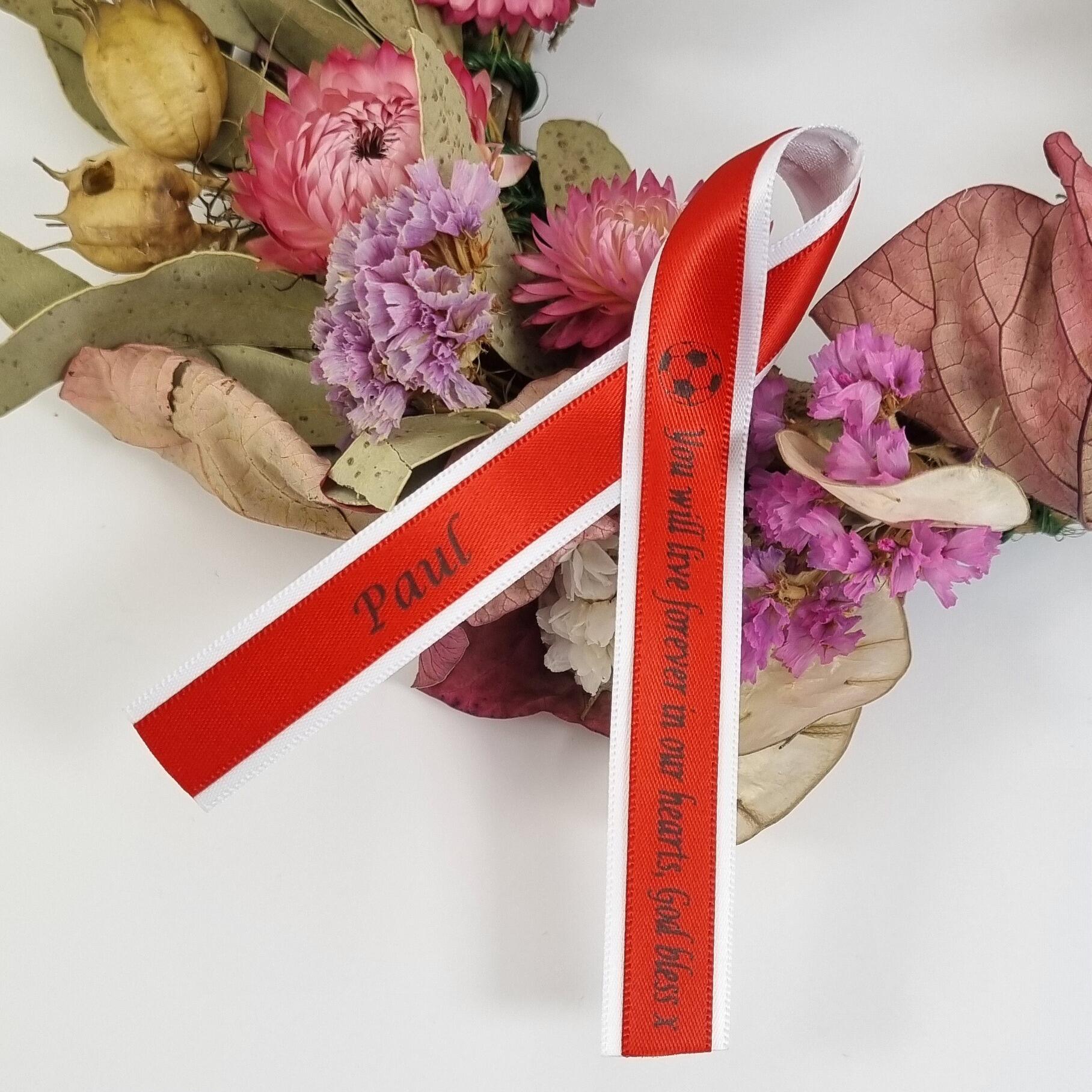 red and white football ribbons