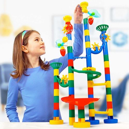 Child playing with marble run