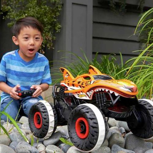 Child playing with Unstoppable Shark Monster Truck Remote Control Vehicle