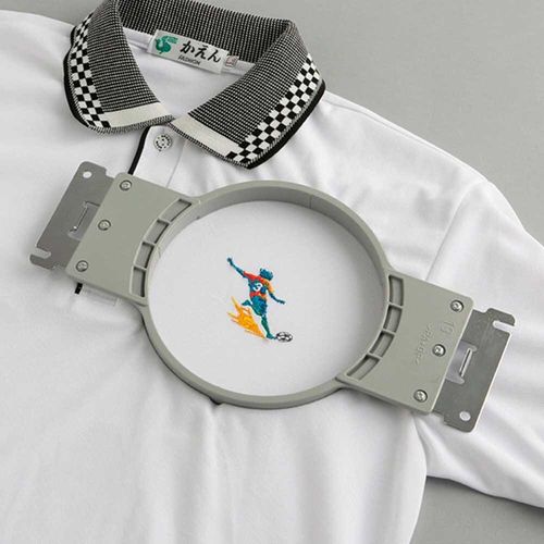 Round hoop fitted to a polo shirt for embroidery
