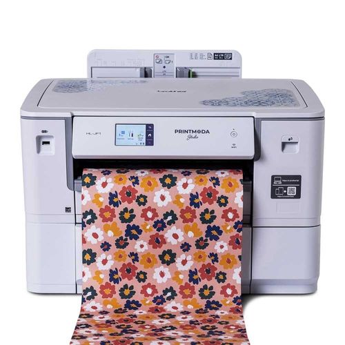 Brother PrintModa Studio Fabric Printer HL-JF1 with printed fabric coming out of the machine