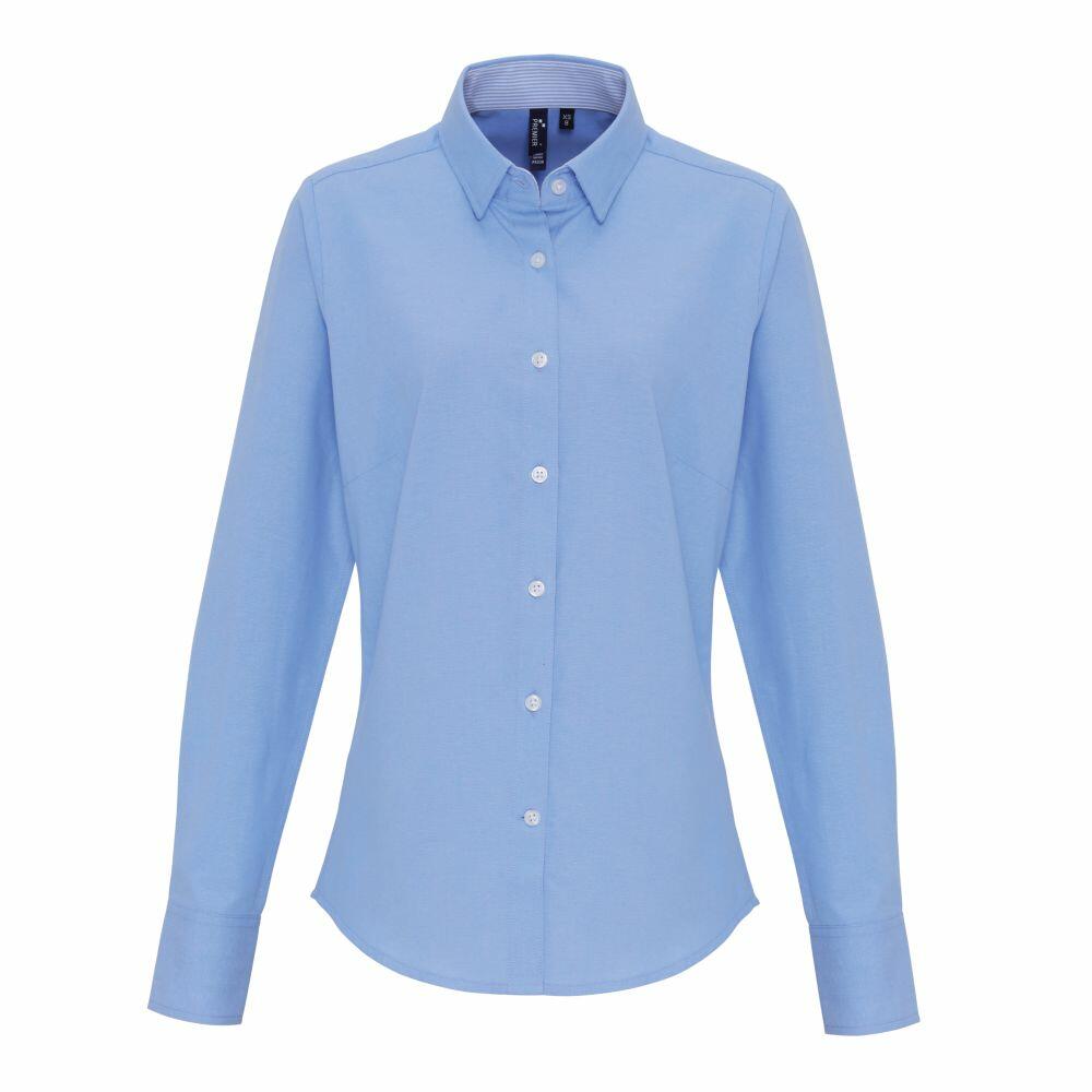 A Premier PR338 light blue long-sleeve button-up shirt set against a white background.