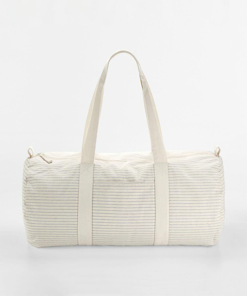 A beige, cylindrical duffel bag with vertical stripes and two fabric handles on a plain white background from Westford Mill called WM258.