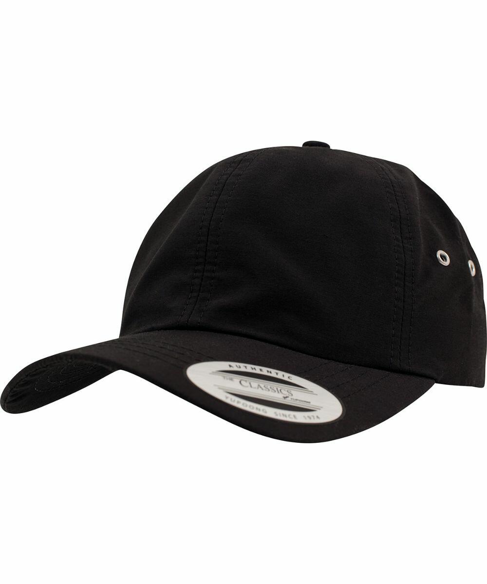 A black YP036 cap by Flexfit By Yupoong with a curved brim, featuring ventilation eyelets on the crown and a sticker on the bill with text and branding.