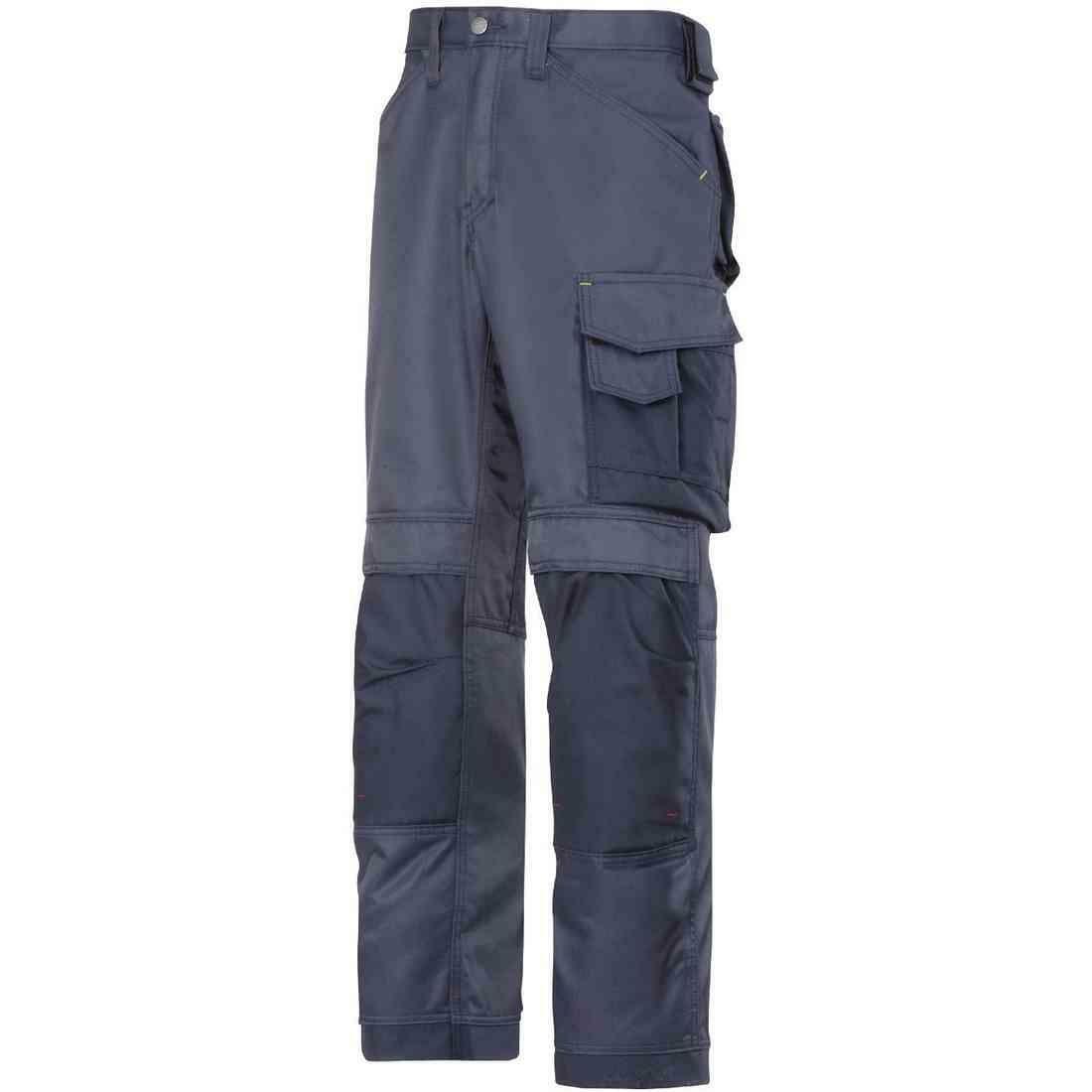 A pair of dark blue, multi-pocket cargo pants designed for workwear. The Snickers X_SN3312 feature reinforced knees, several pockets including a large side cargo pocket, and belt loops. The fabric appears durable and suitable for heavy-duty tasks.
