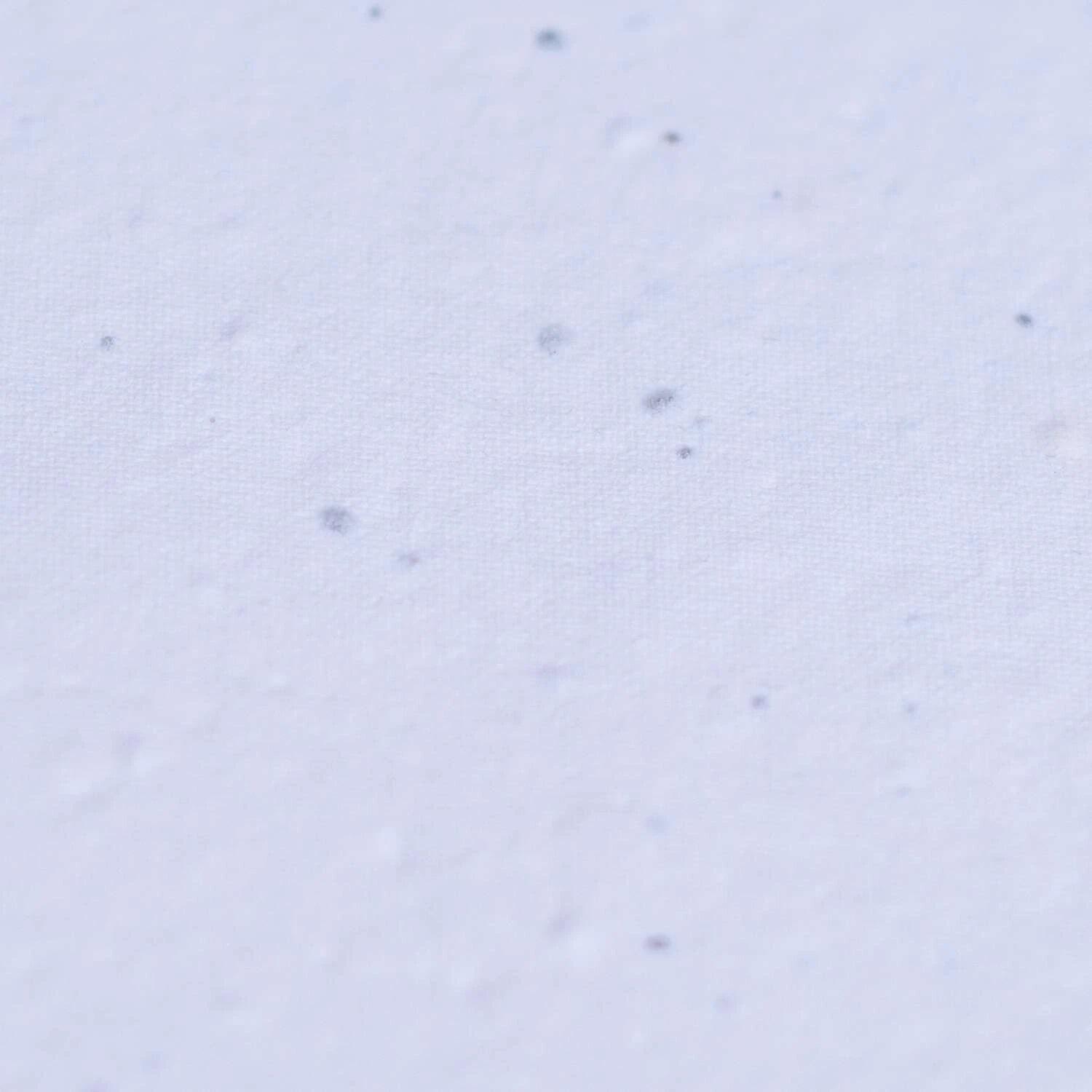 Close up of seeded paper