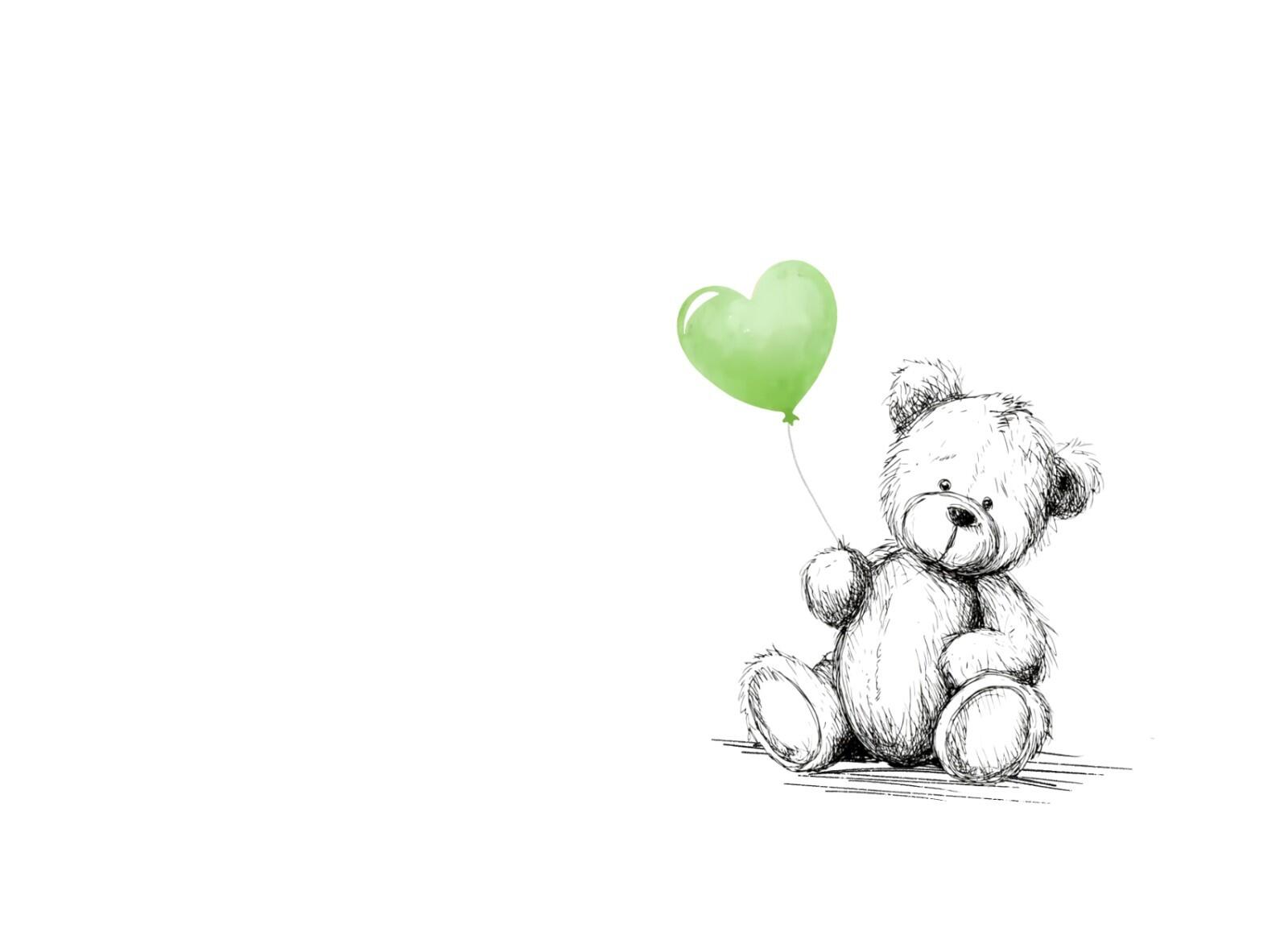 The image of the bear holding a green balloon