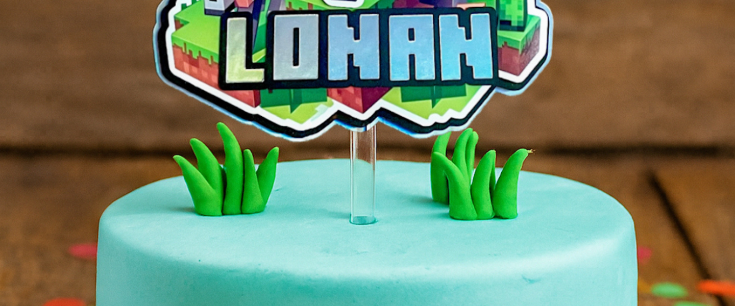 Minecraft cake topper, personalised with name and age, bright minecraft themed colours with 3d effect layers featuring Minecraft Steve and other characters.