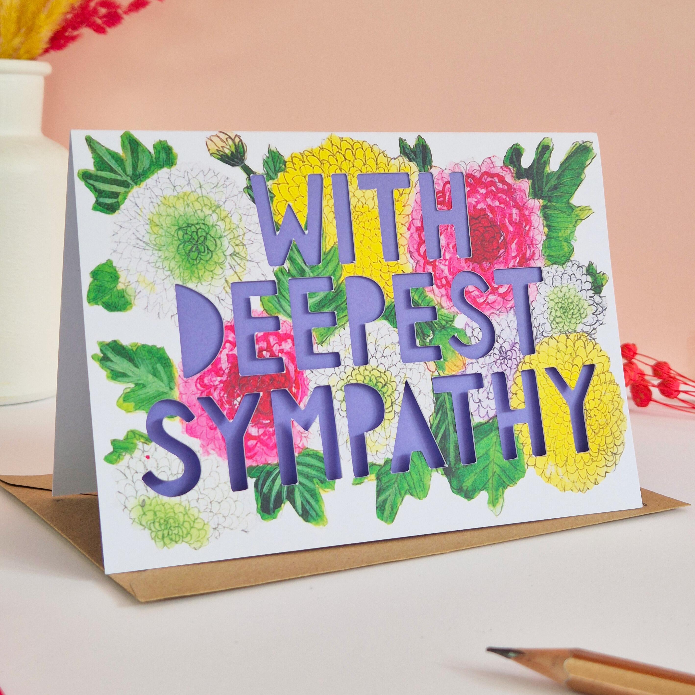 Carnation illustration card with With Deepest Sympathy die cut text and purple liner