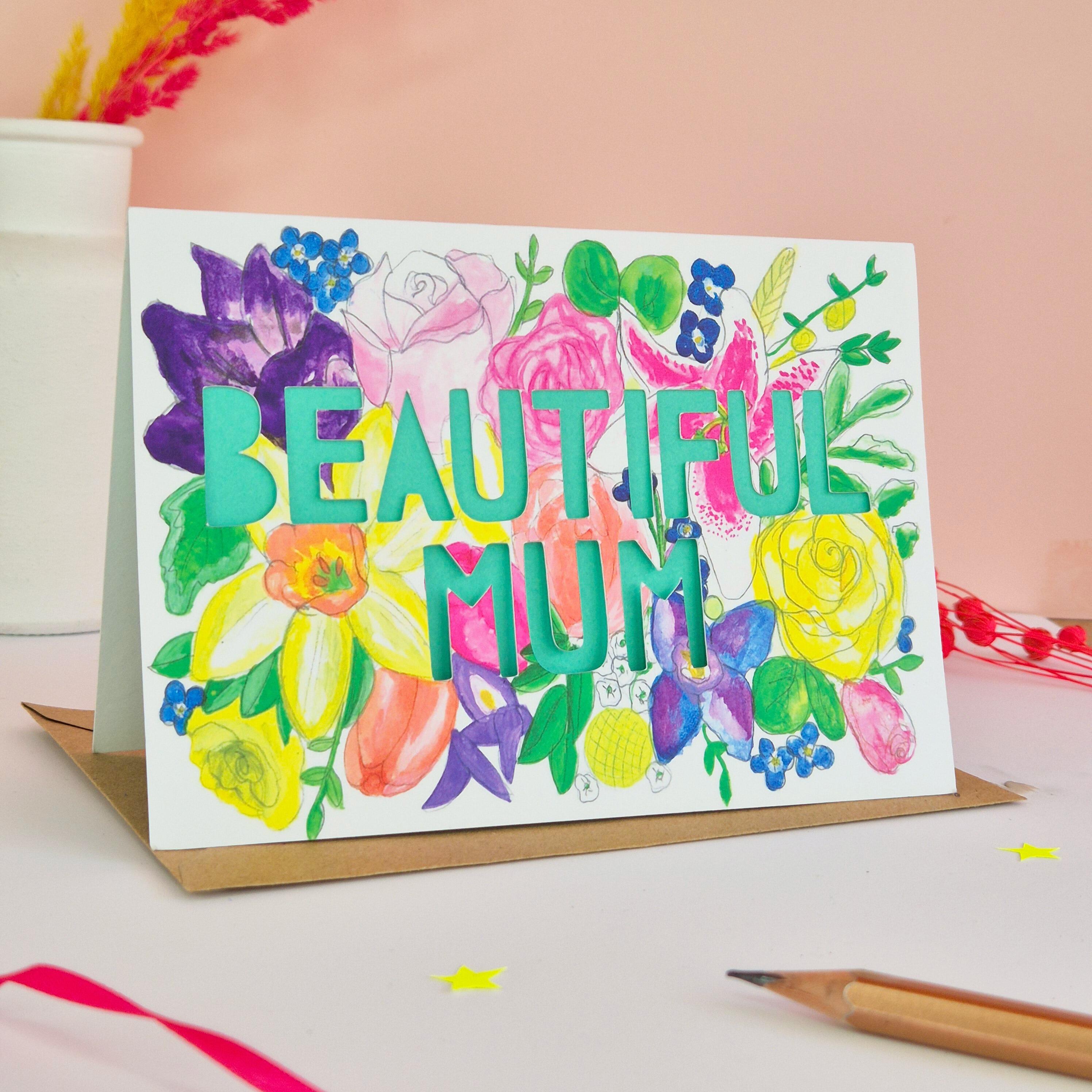 Pretty floral illustration card with Beautiful Mum die cut text and turquoise paper liner
