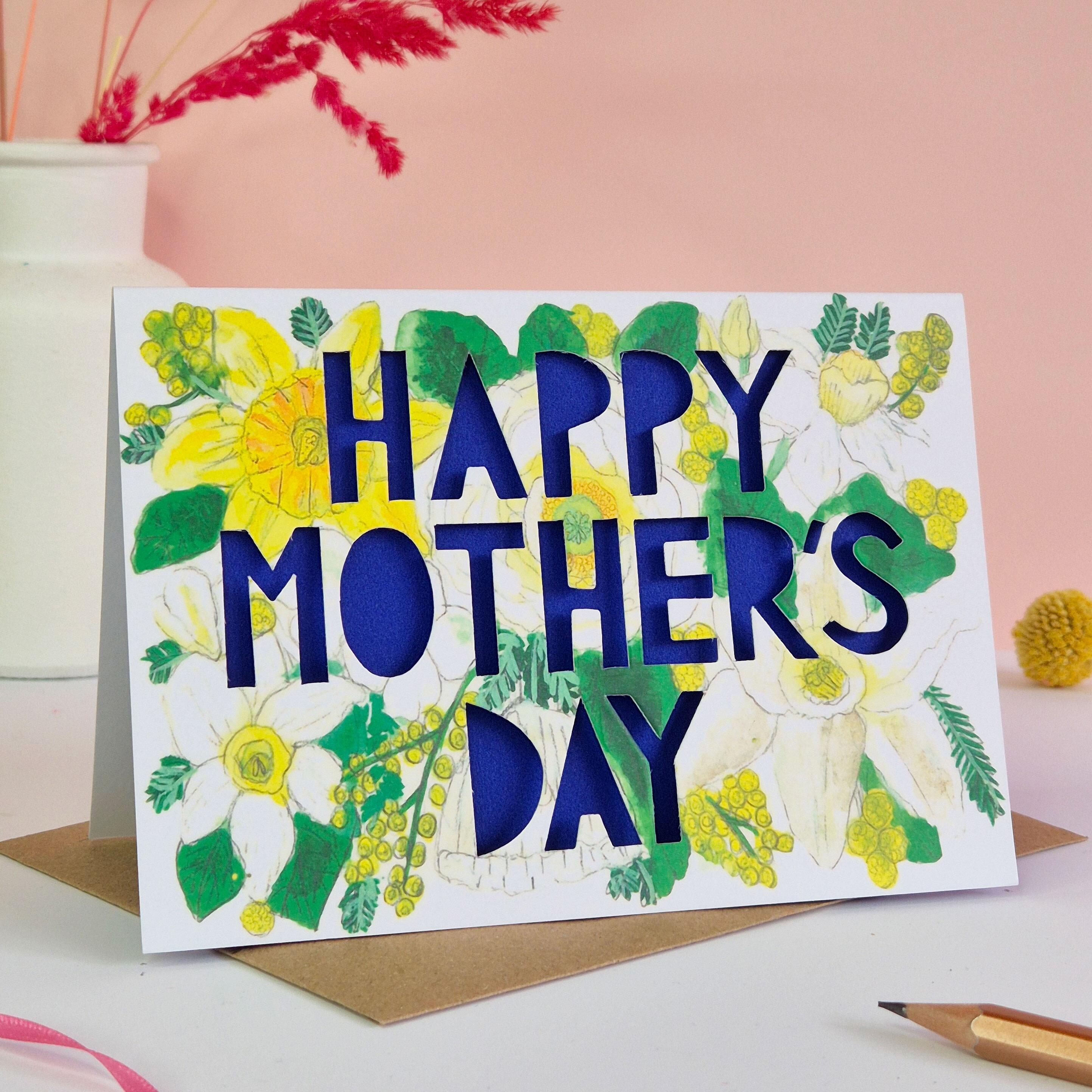 Happy Mothers day card with blue paper cut letters