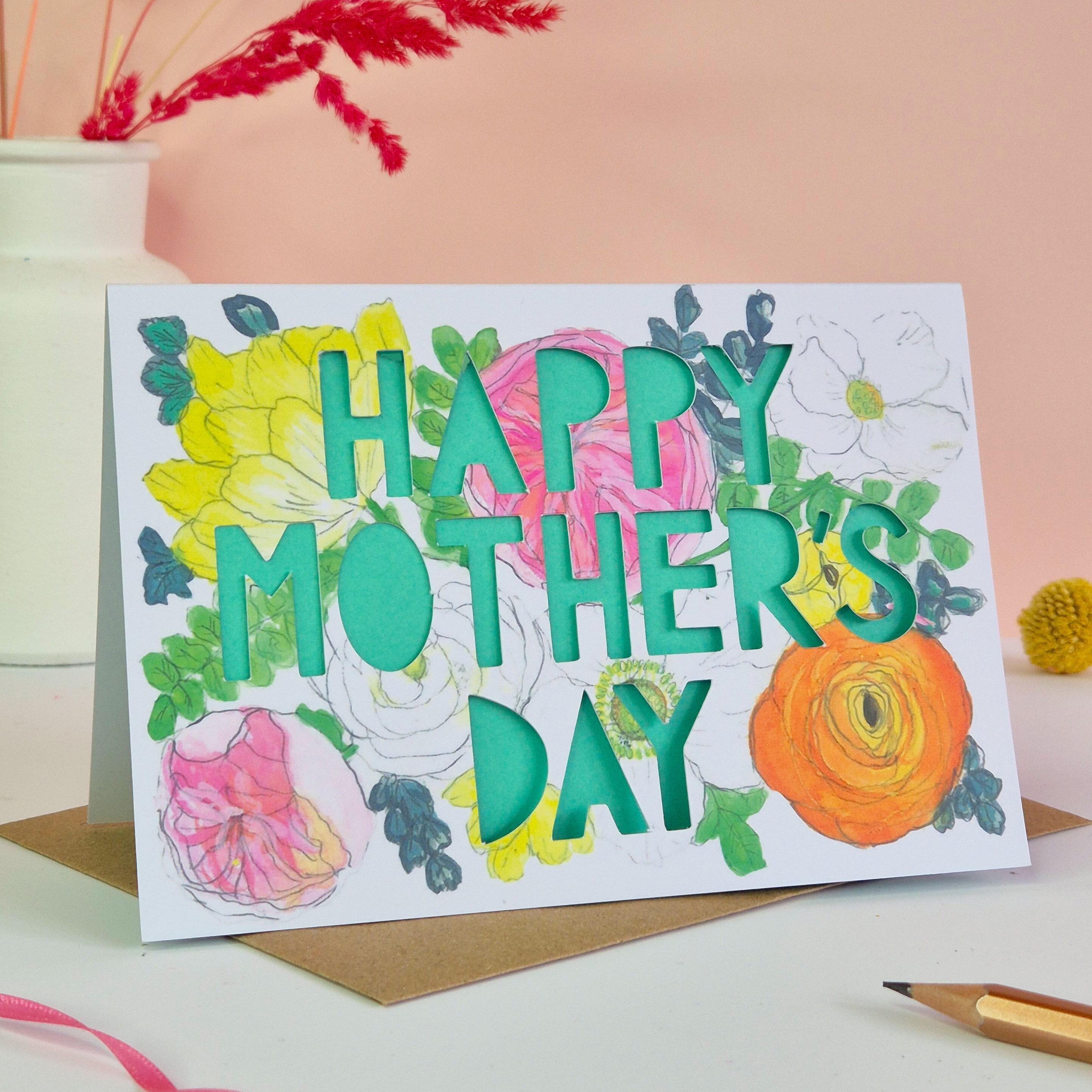 Happy Mother's Day in spring design with turquoise paper cut text