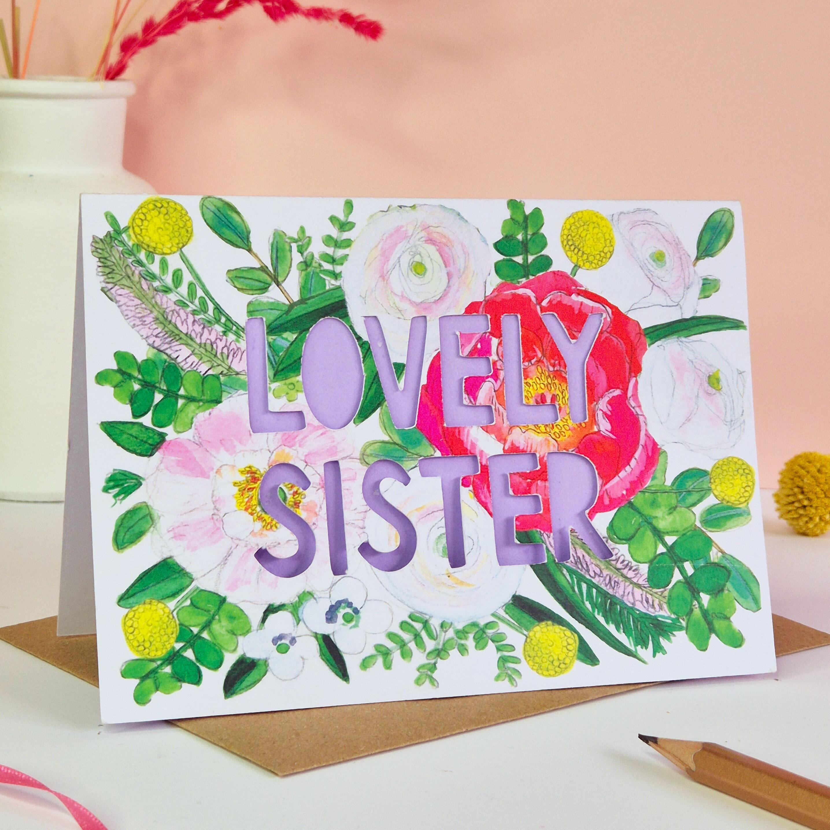 Lovely sister paper cut card with lilac paper cut out text