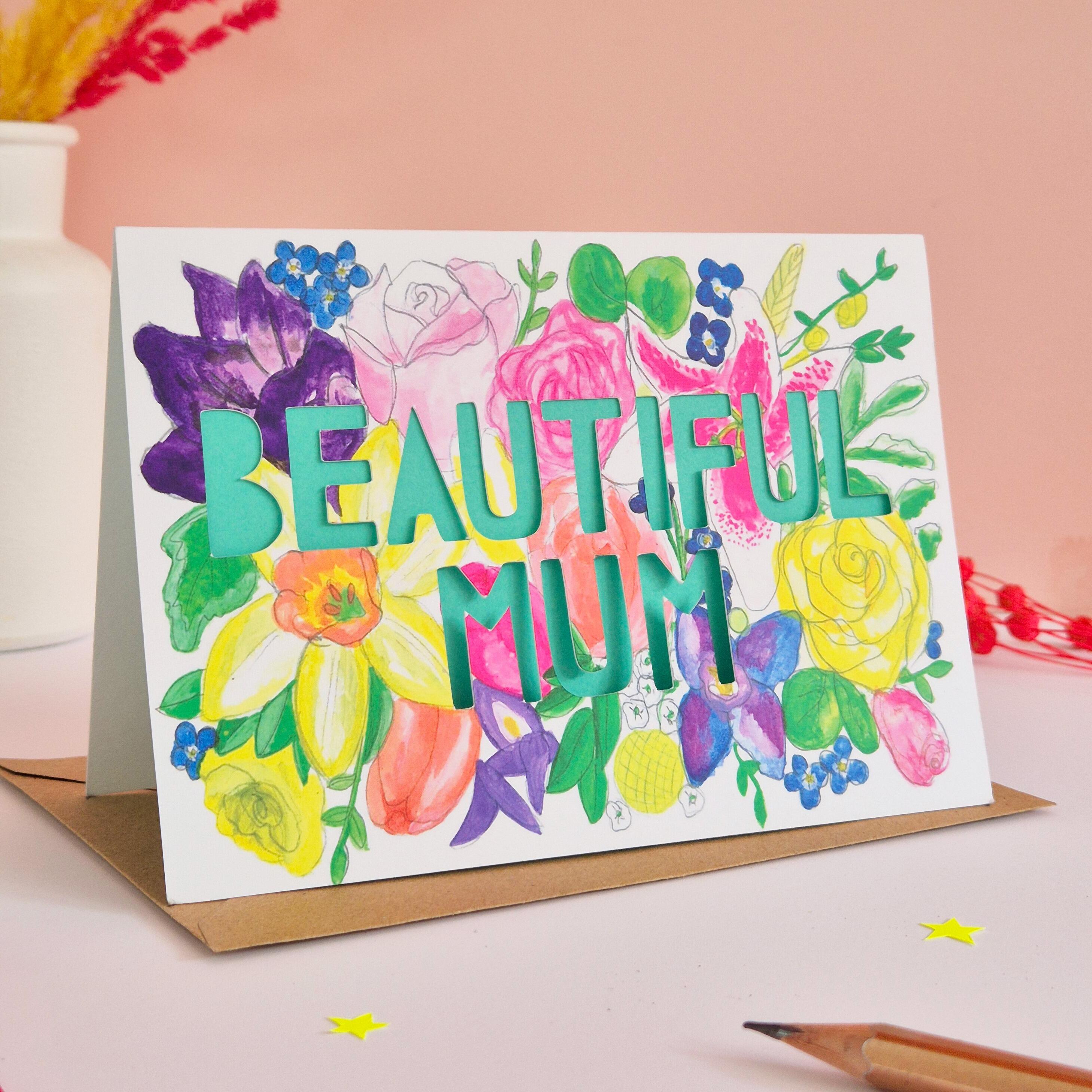 Pretty floral illustration card with Beautiful Mum die cut text and turquoise paper liner