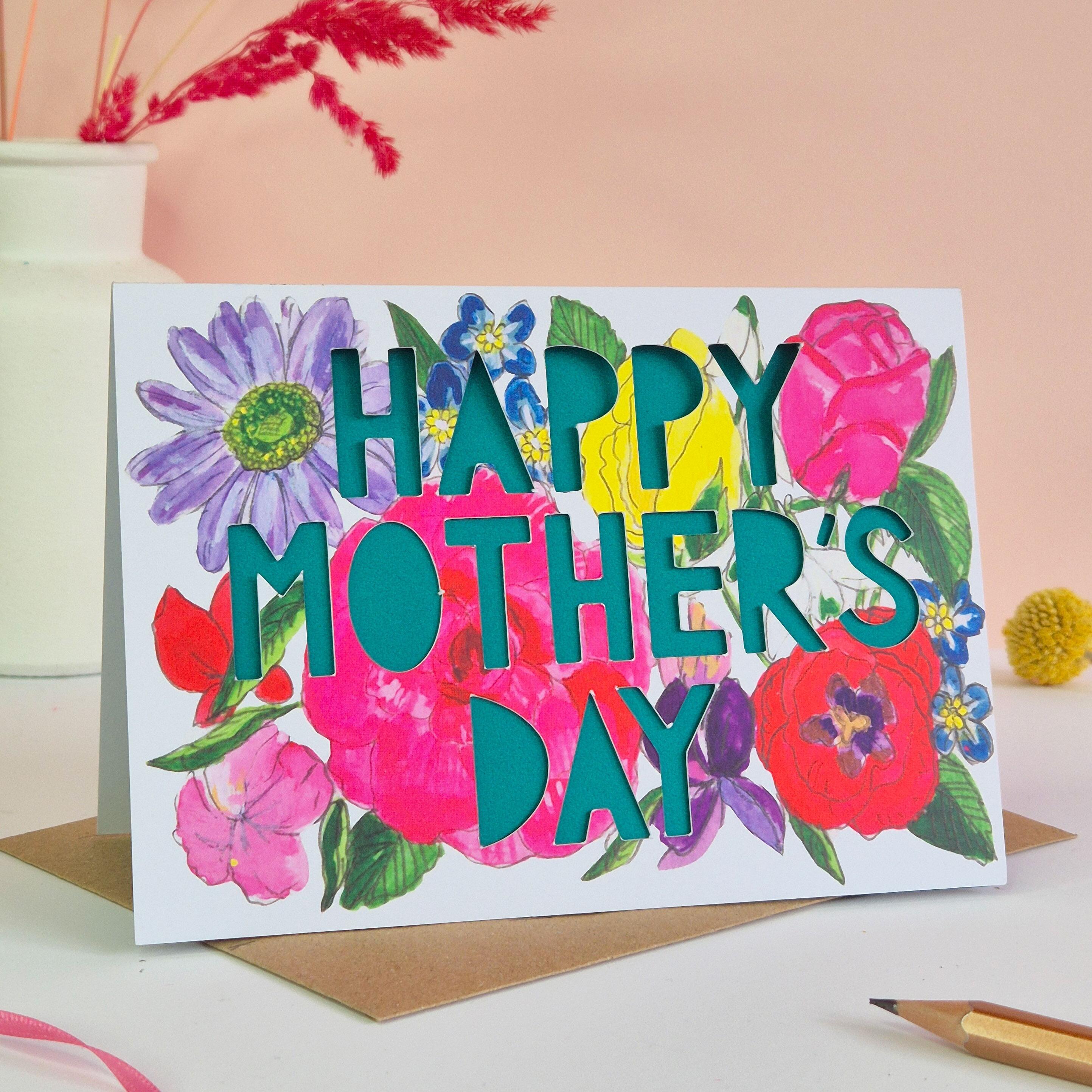 Bright floral Mother's Day card with green paper cut lettering