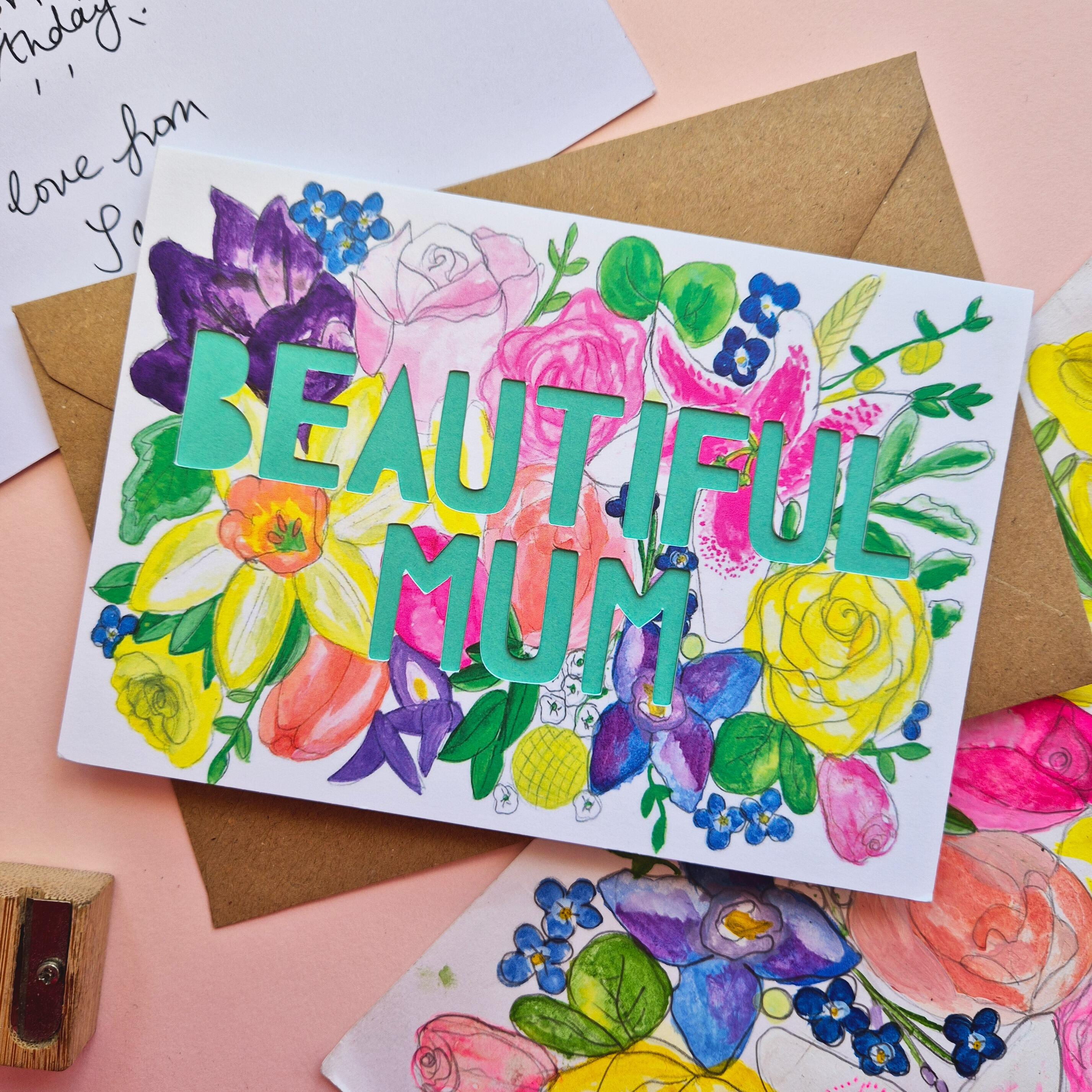 Pretty floral illustration card with Beautiful Mum die cut text and turquoise paper liner