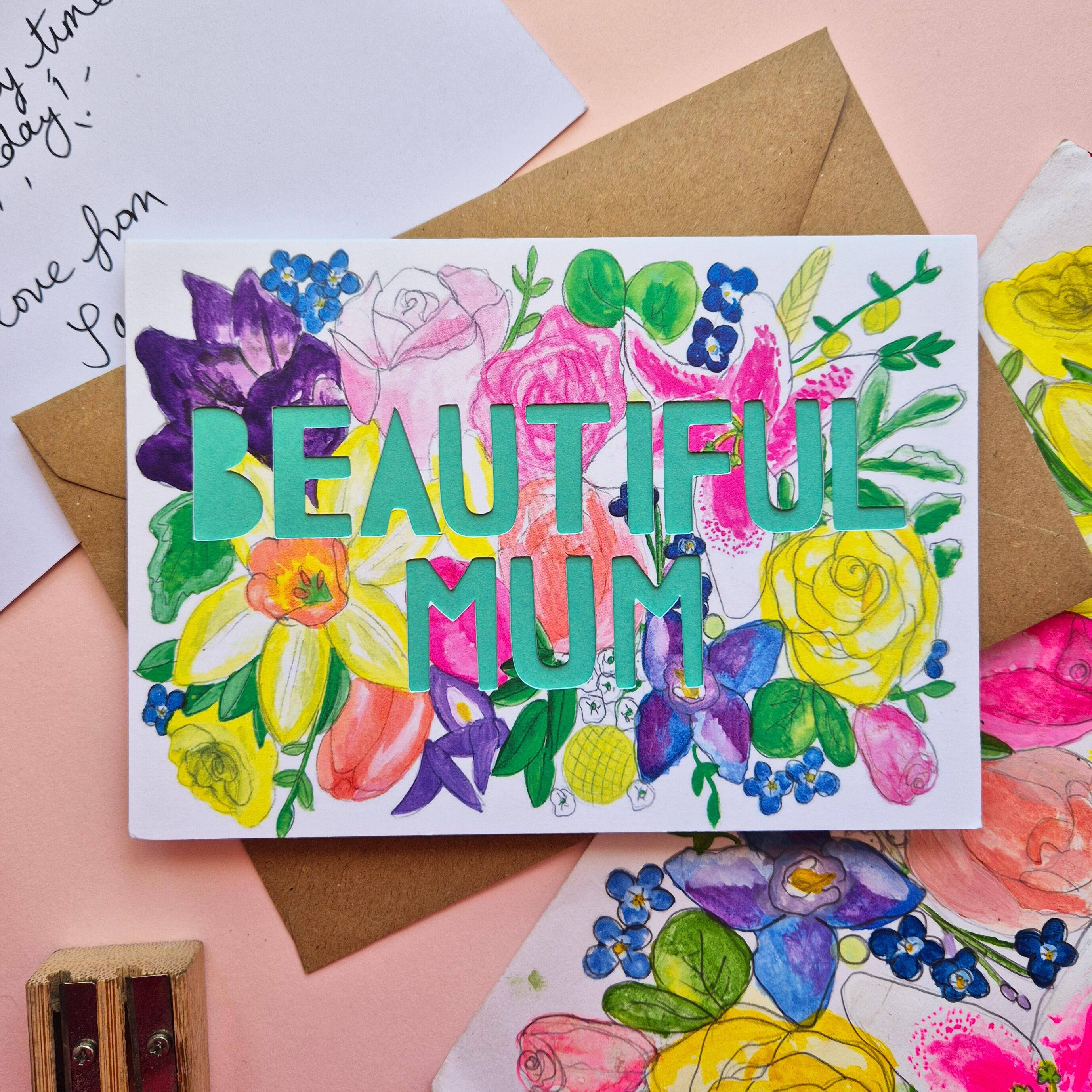Pretty floral illustration card with Beautiful Mum die cut text and turquoise paper liner