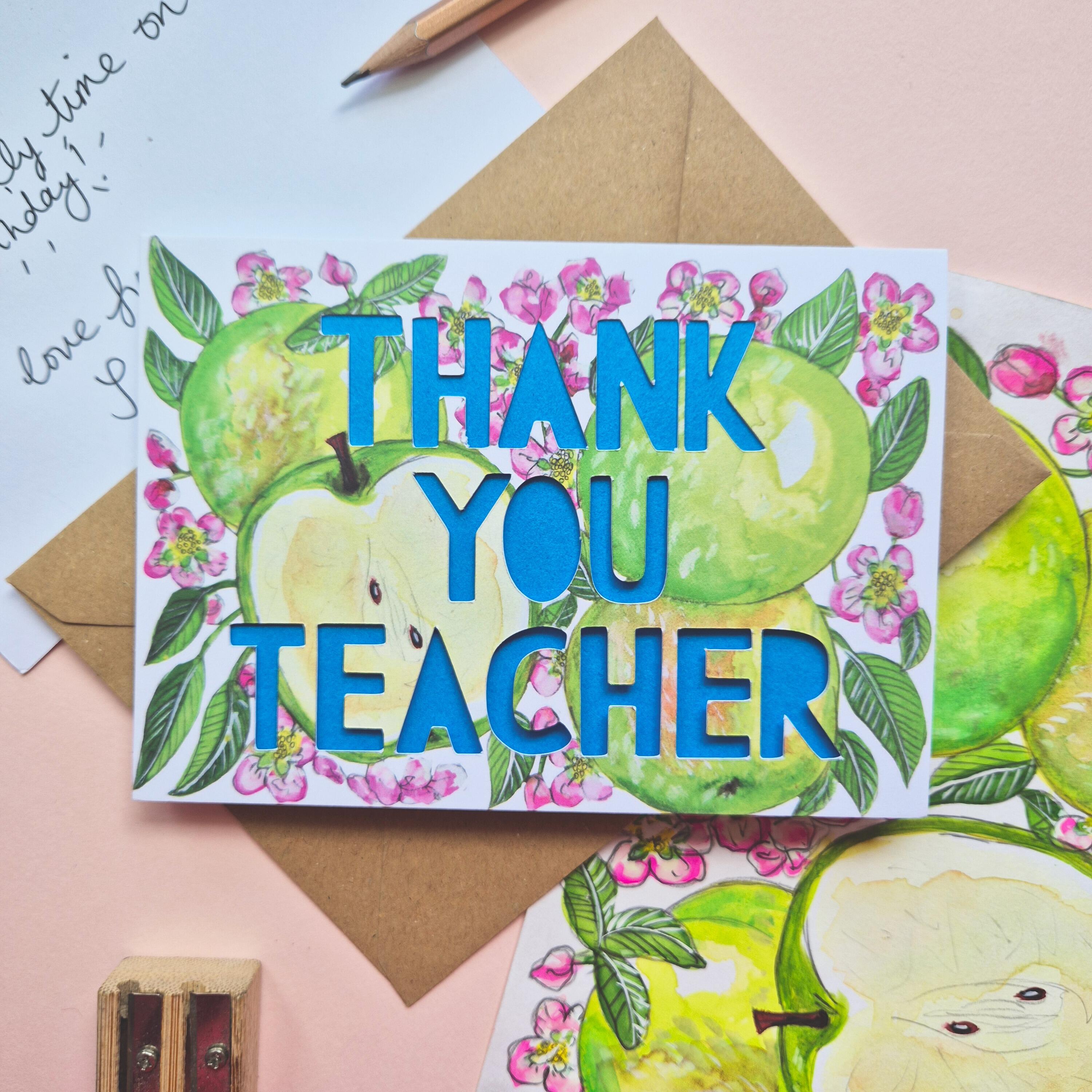 Floral and apple illustration with Thank You teacher paper cut text and bright blue backing paper