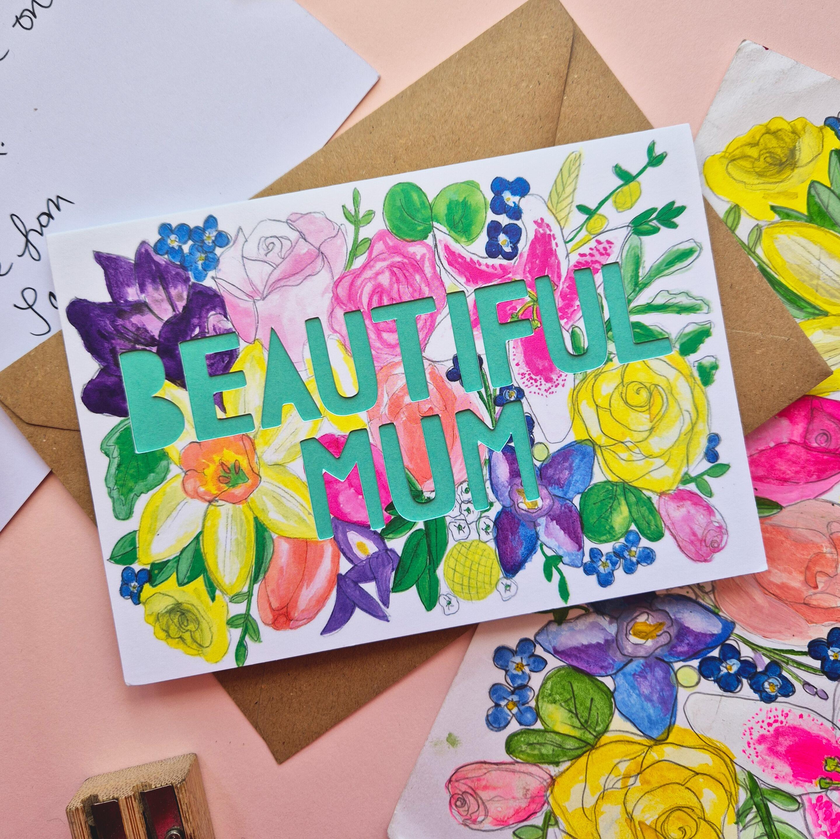 Pretty floral illustration card with Beautiful Mum die cut text and turquoise paper liner