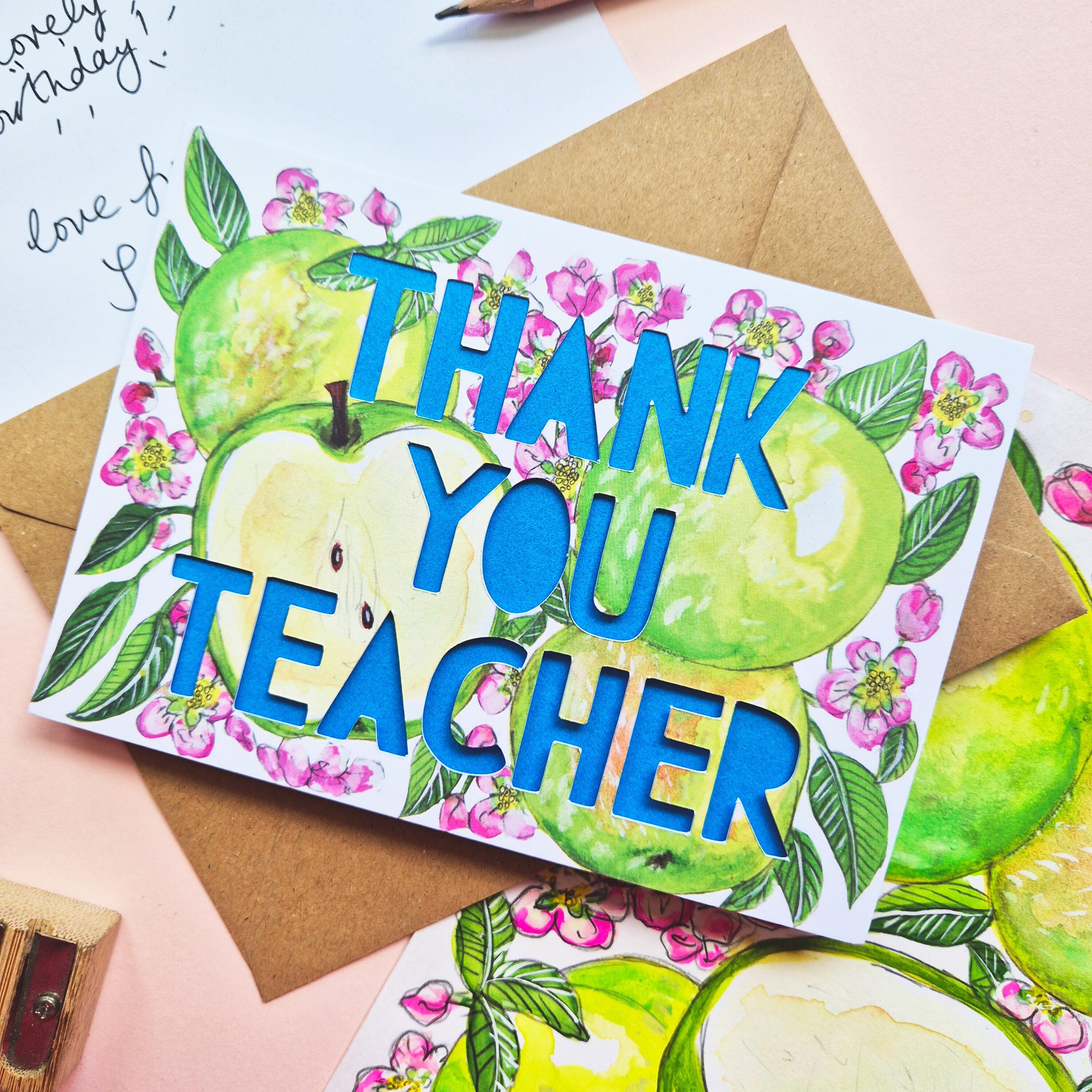 Floral and apple illustration with Thank You teacher paper cut text and bright blue backing paper