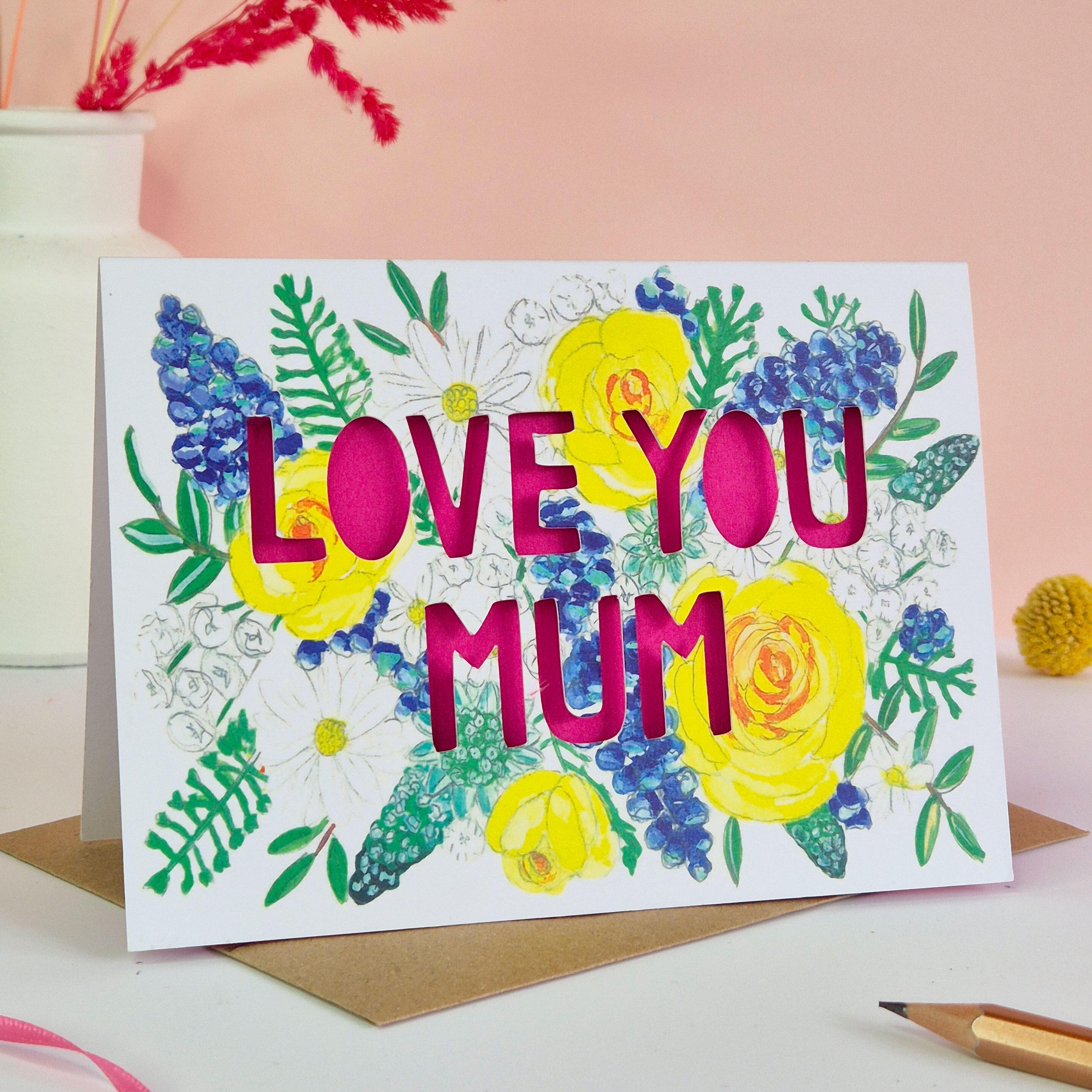 Card with 'Love you mum' in paper cut text with pink liner