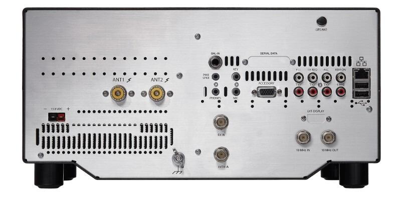 FLEX-8400 transceiver showing frequency display and control knobs in ham radio room