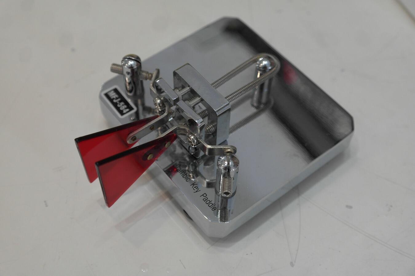 MFJ-564 chrome Morse code paddle close up