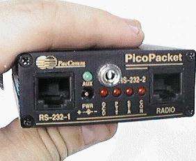 Paccomm picopacket interface between ordinary voice radios,