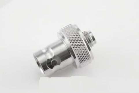 Close-up of SMA(F) to BNC(F) adapter with nickel-plated connectors