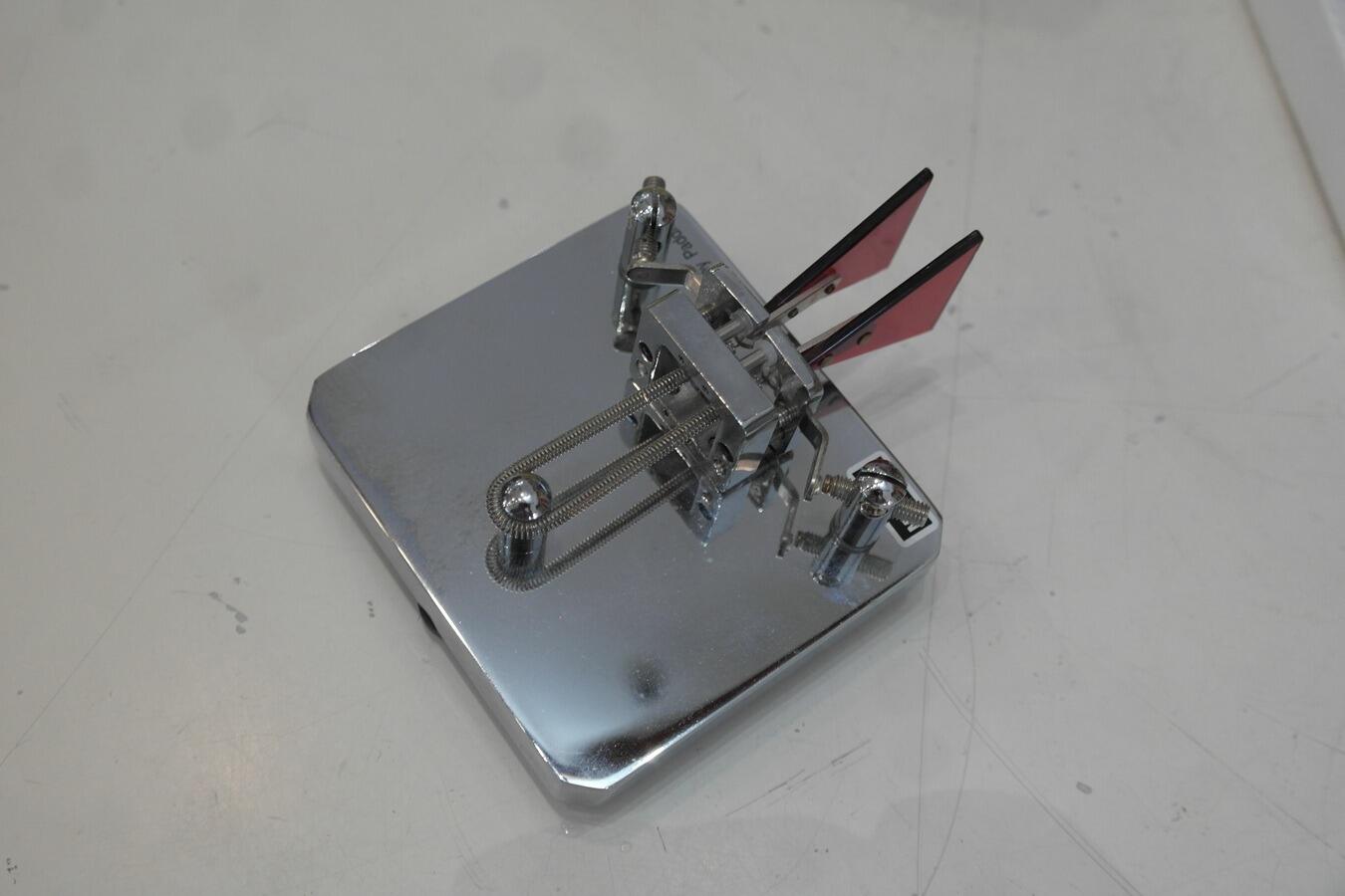 MFJ-564 chrome amateur radio Morse key side view