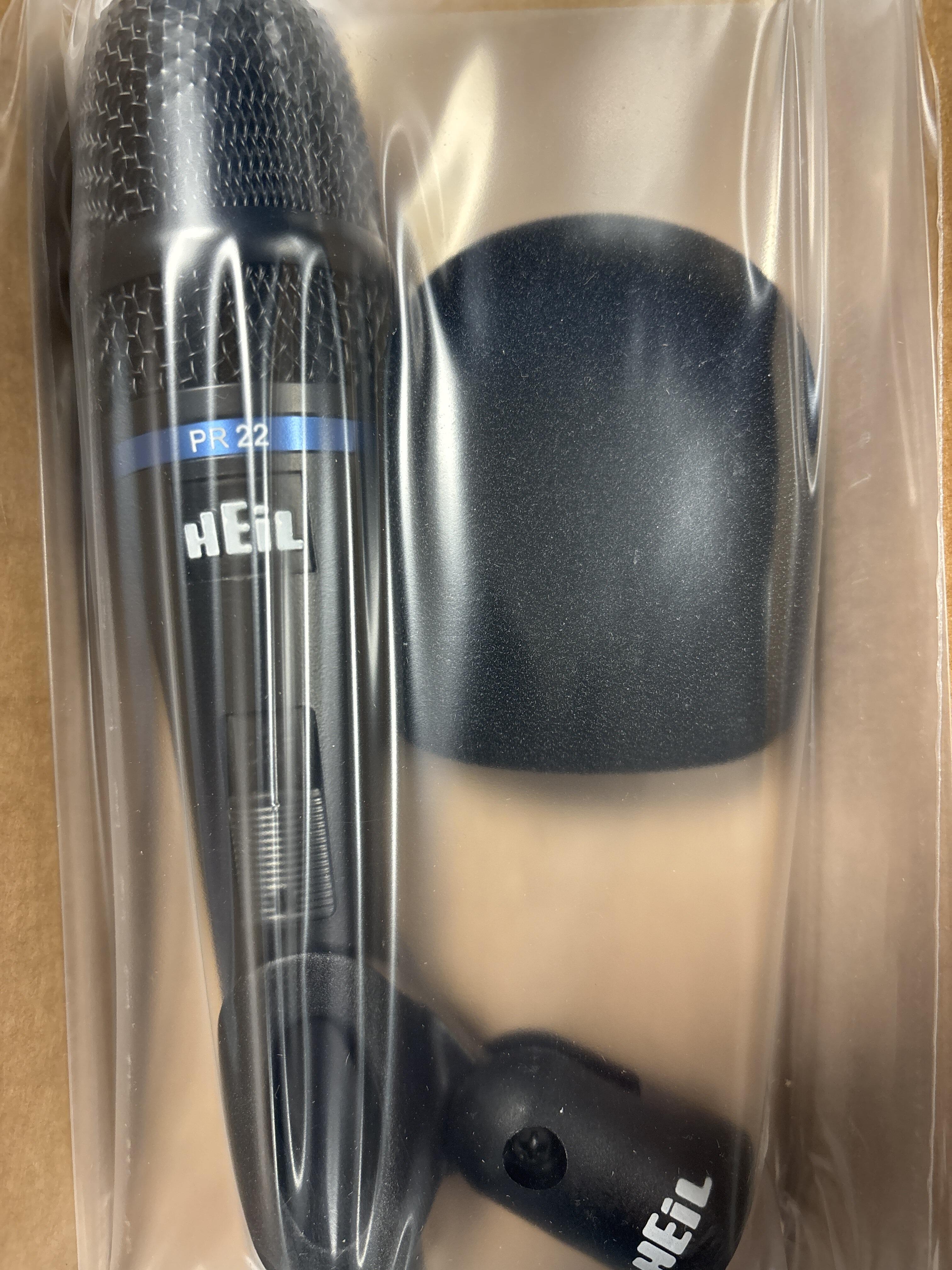 Stainless mesh grill, foam windscreen, and mic clip