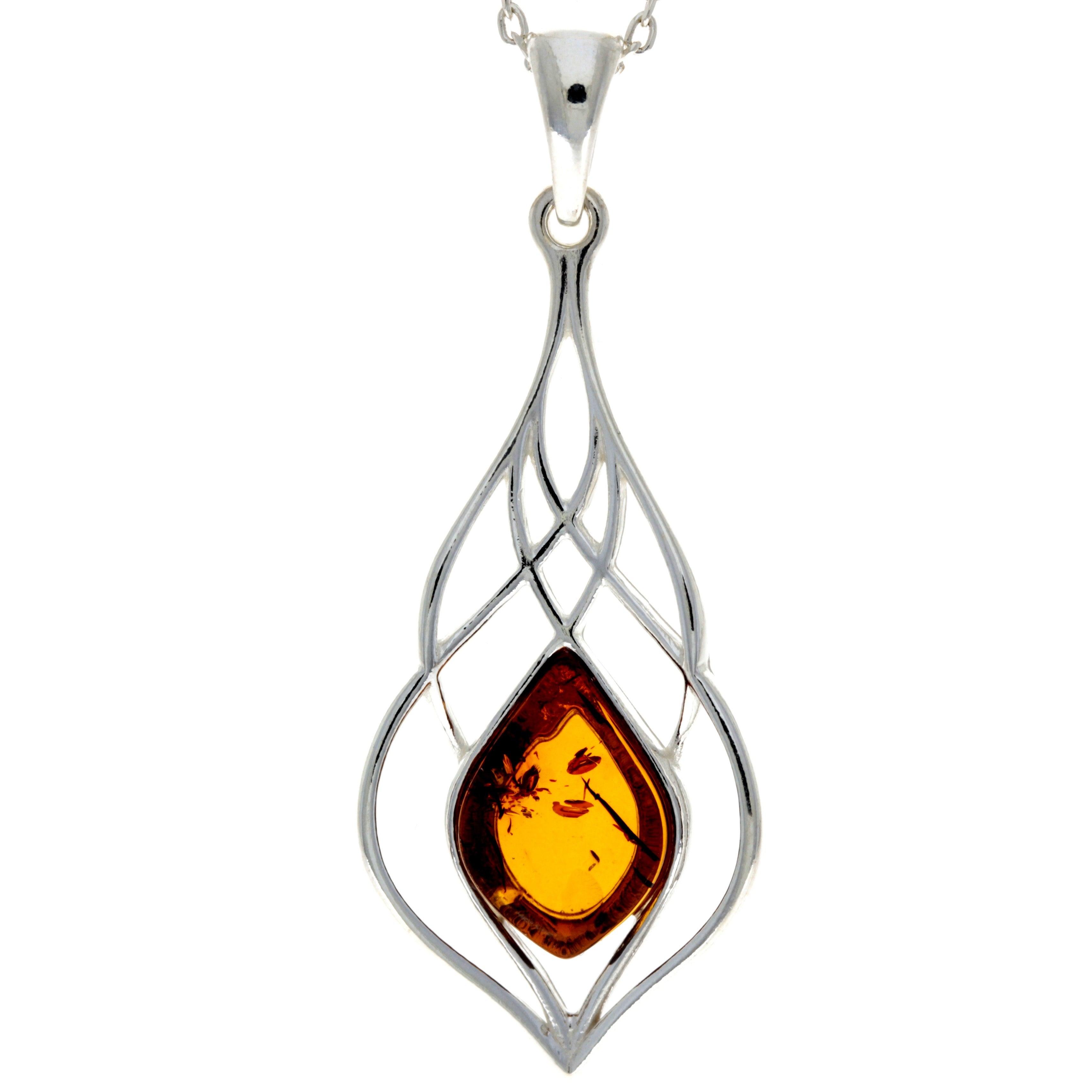 Image#1 Genuine Baltic Brown Amber Modern Celtic Pendant