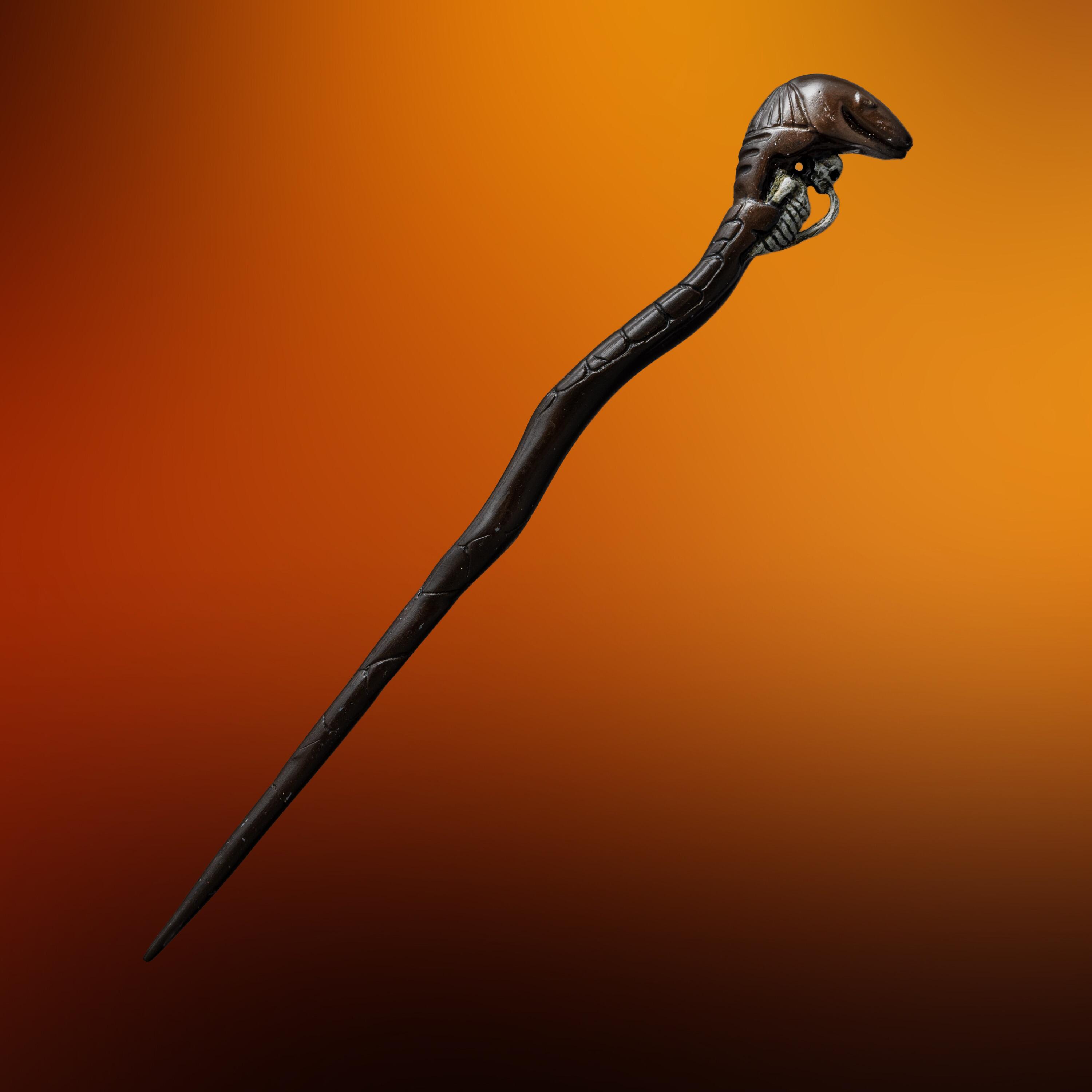 Full length diagonal view - An original production-made Death Eater Skull Wand created for Harry Potter and the Deathly Hallows: Part 1 (2010) and Part 2 (2011).