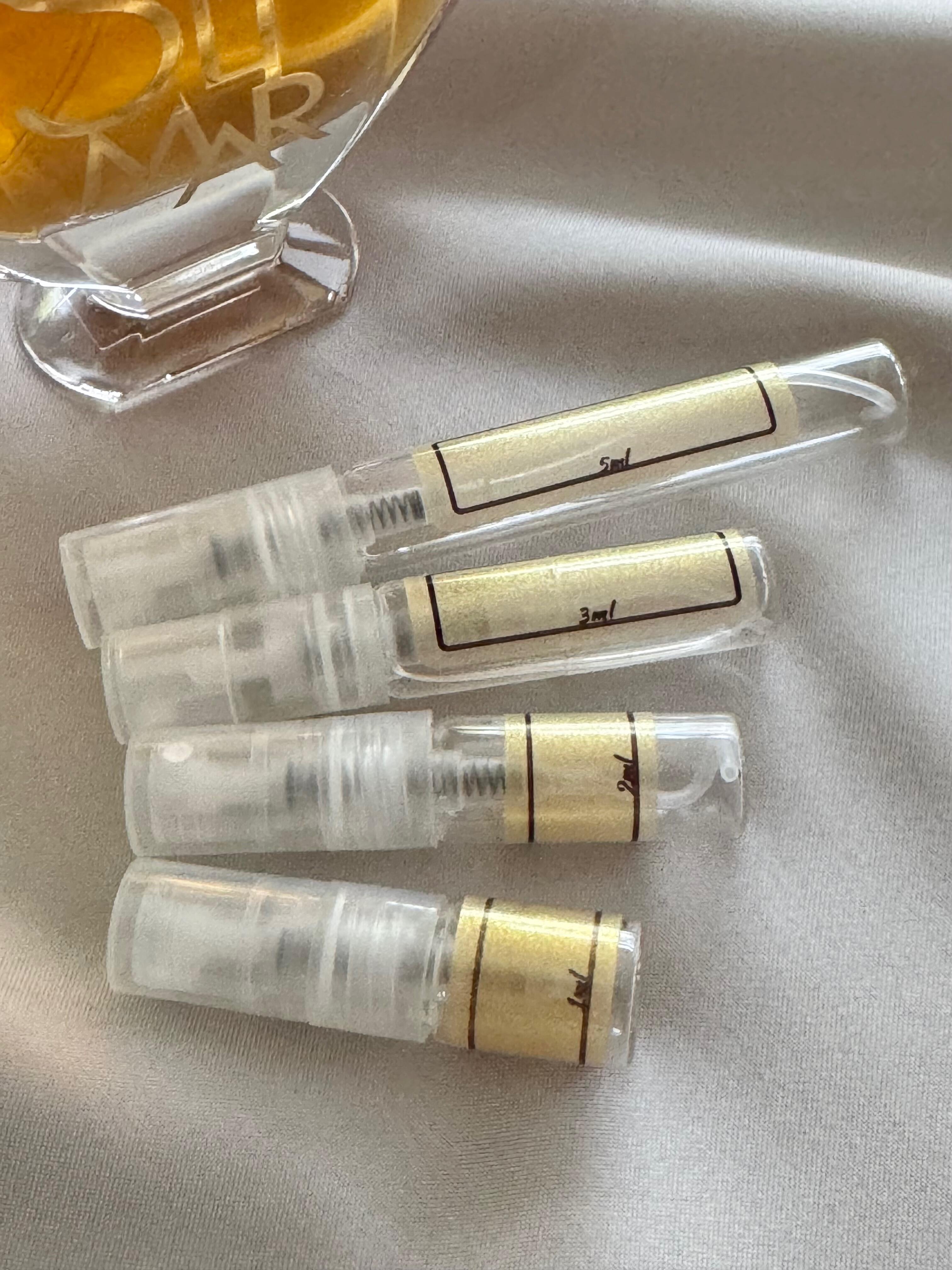 Guerlain Shalimar L'Essence and sample bottles