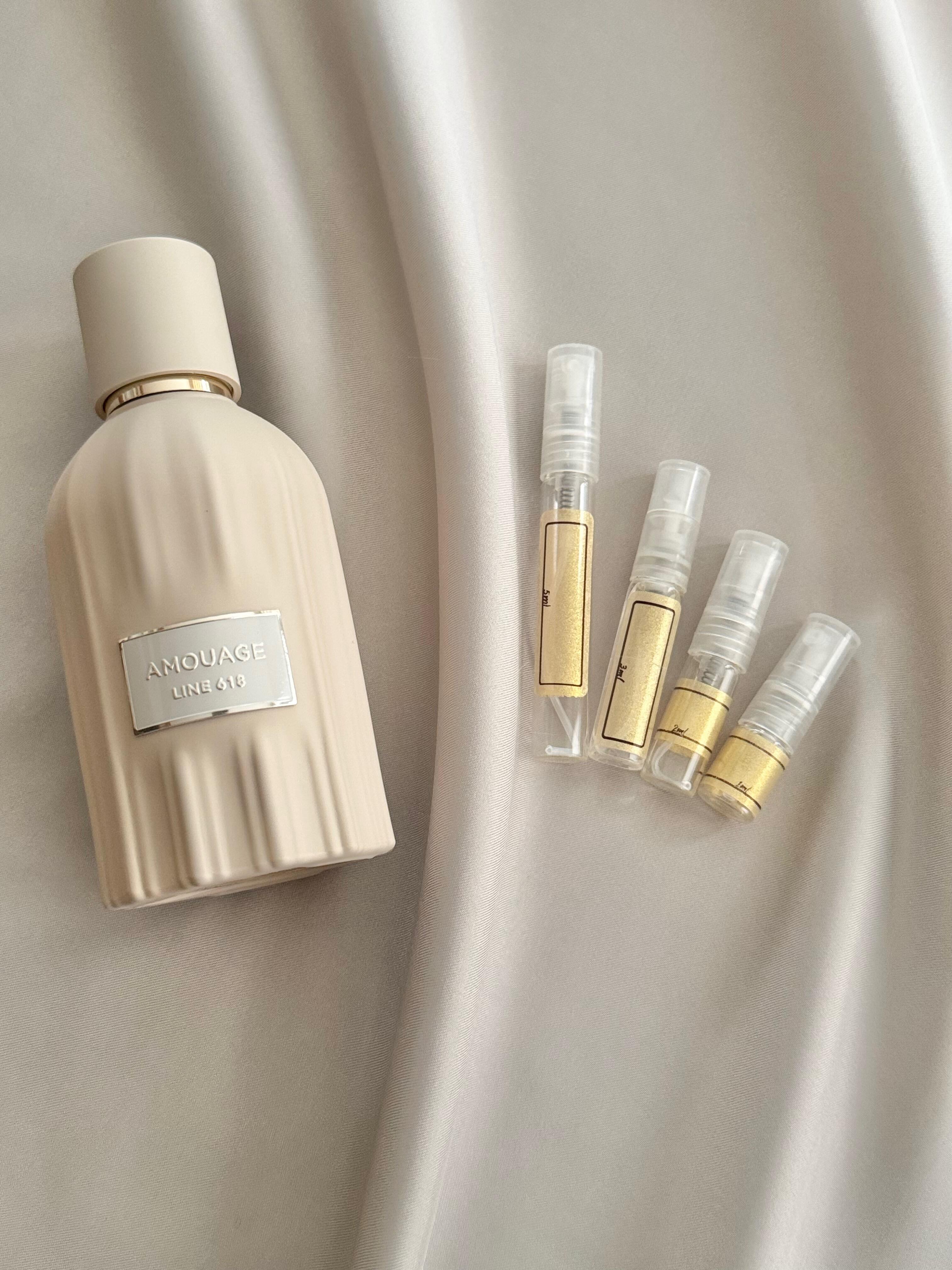 Amouage Line 618 with sample bottles