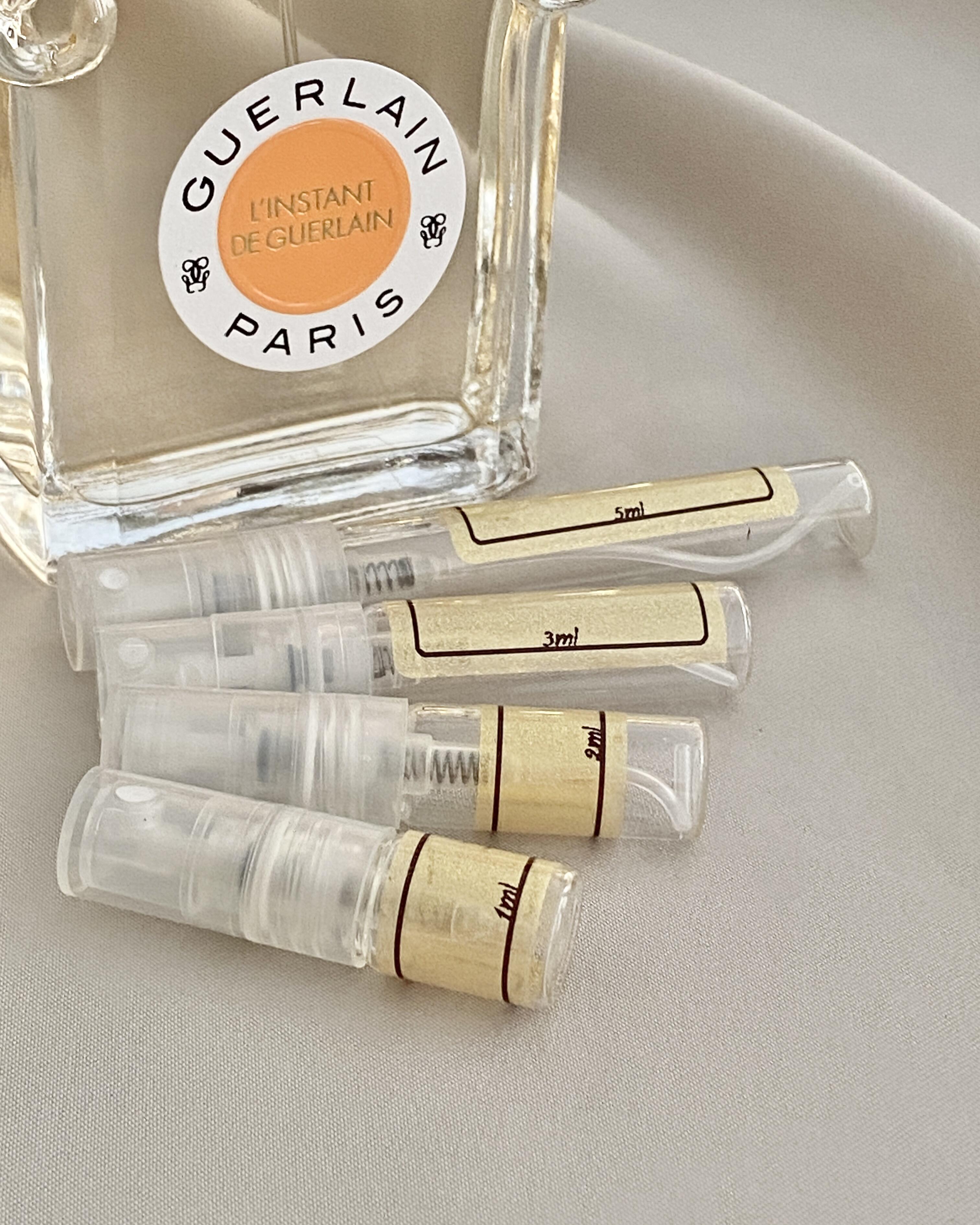 Guerlain L'Instant de Guerlain with sample bottles