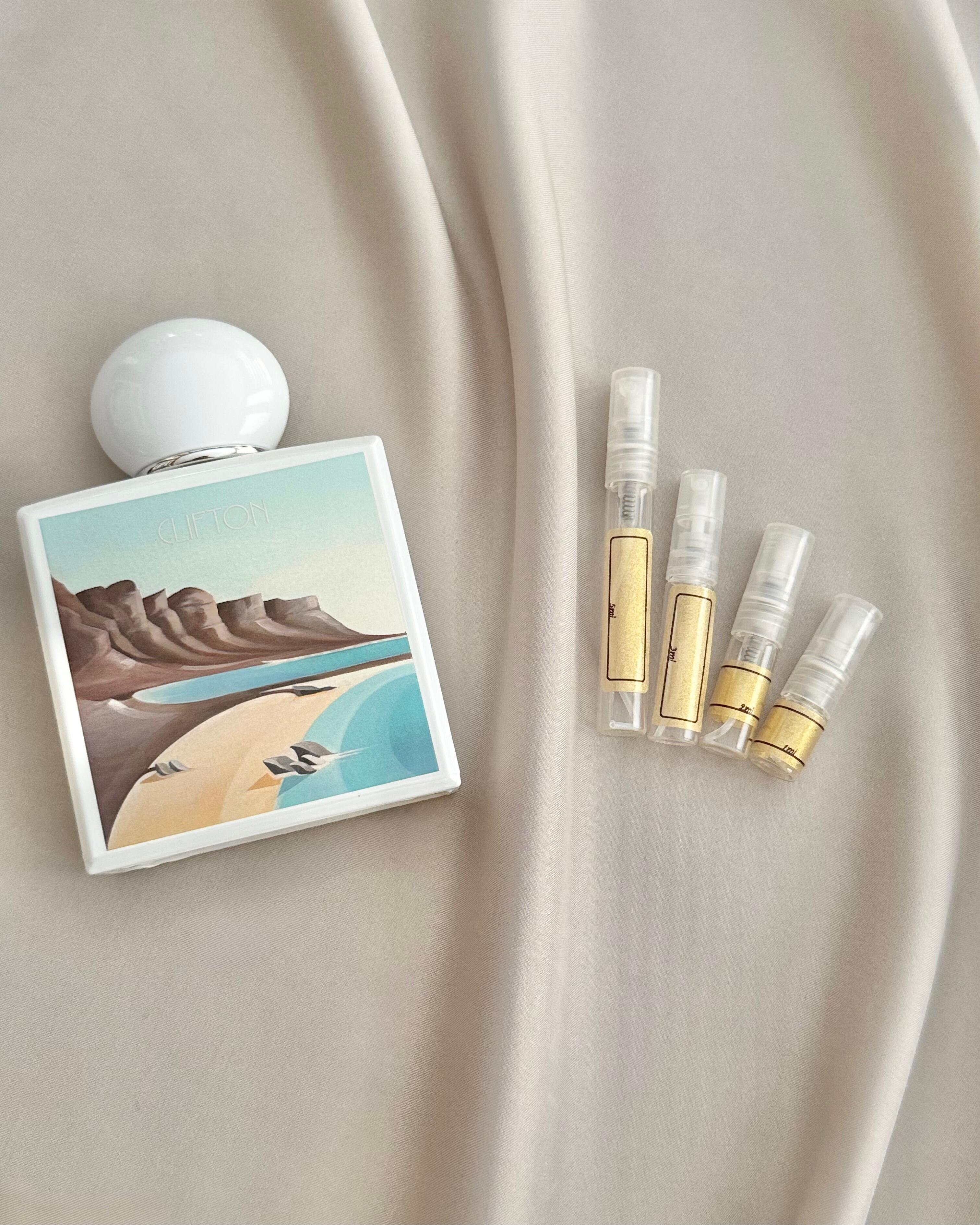 Adamo Parfum Clifton bottle with sample bottles