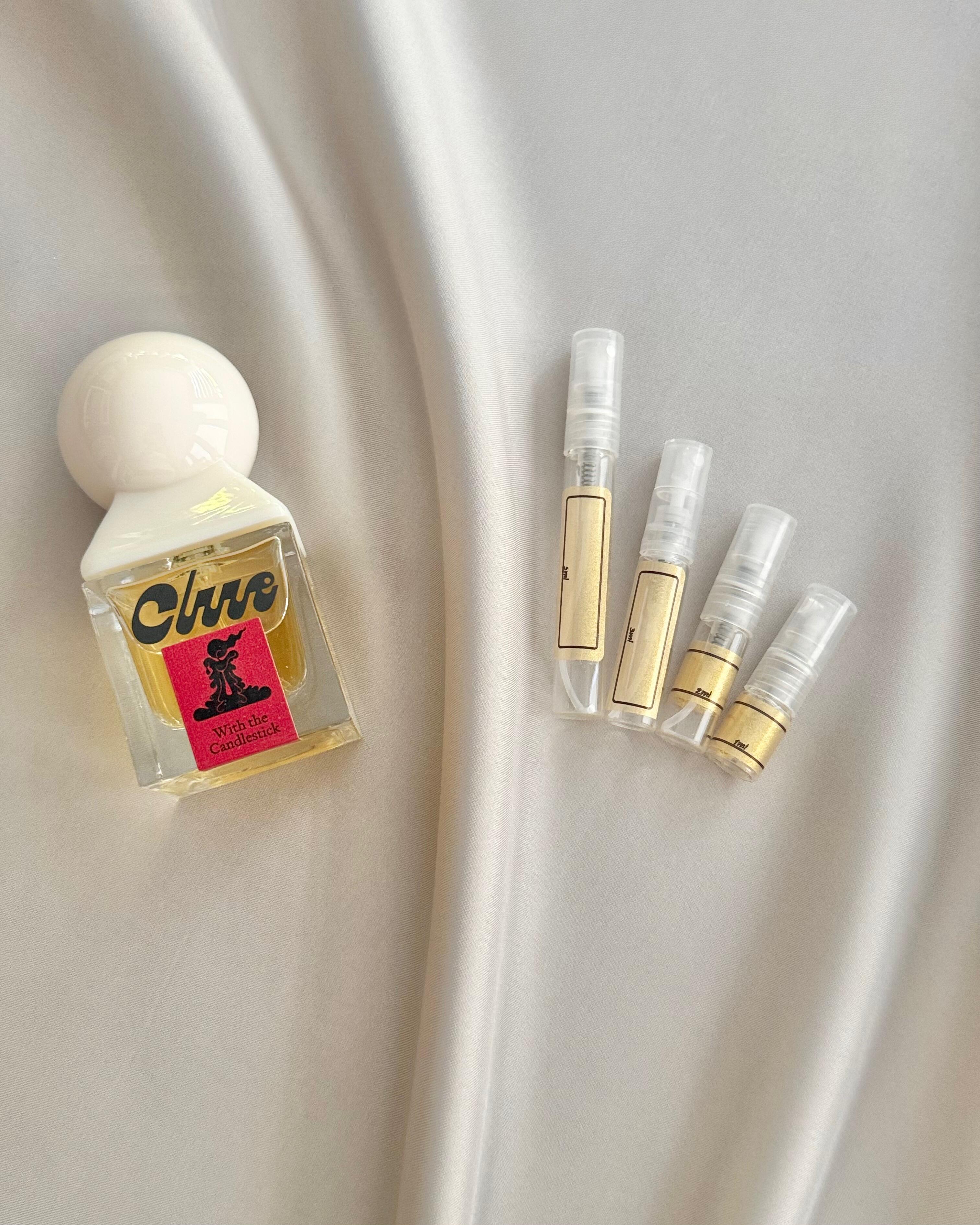 Clue Perfumery With The Candlestick with sample bottles